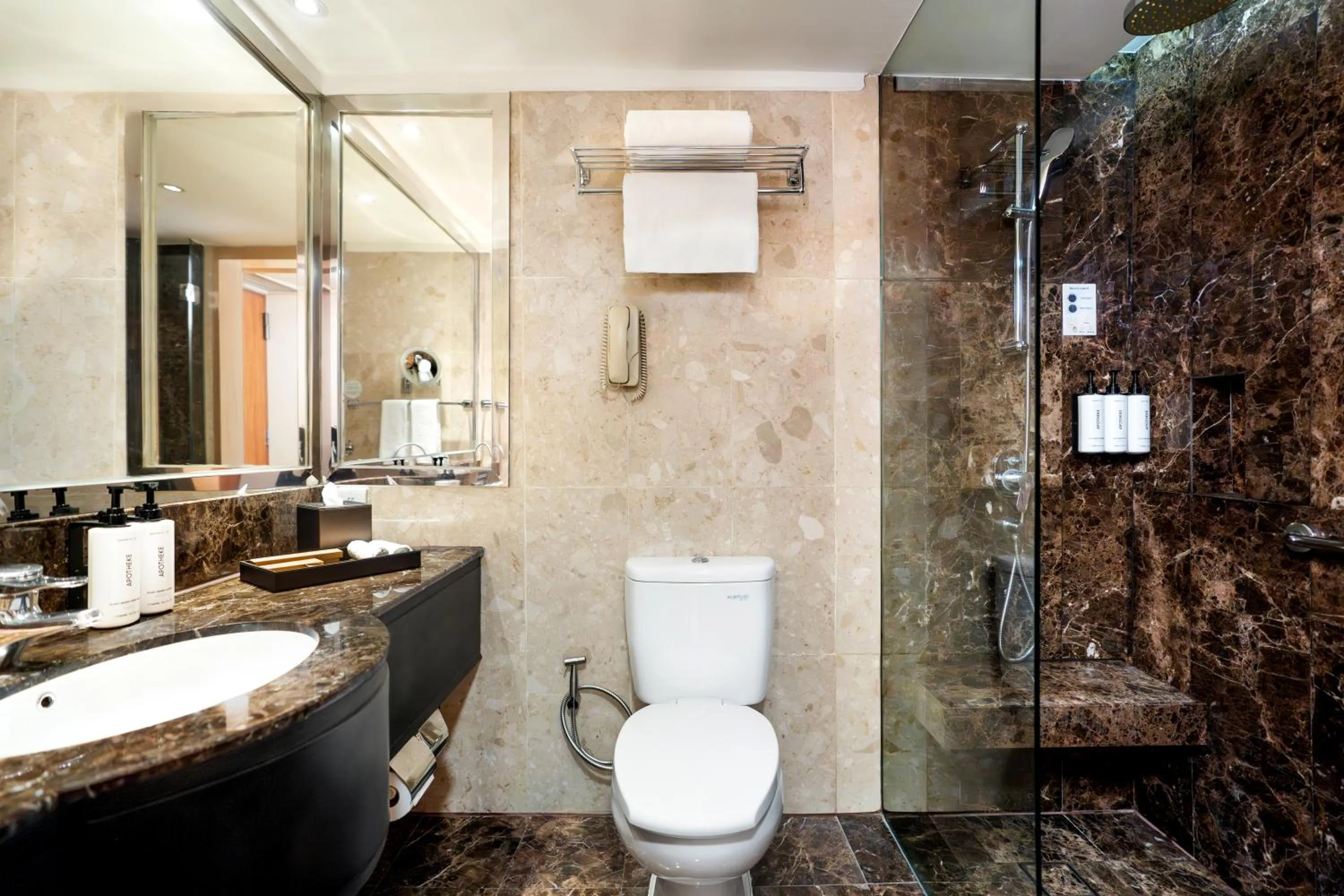 Bathroom in voco Orchard Singapore by IHG