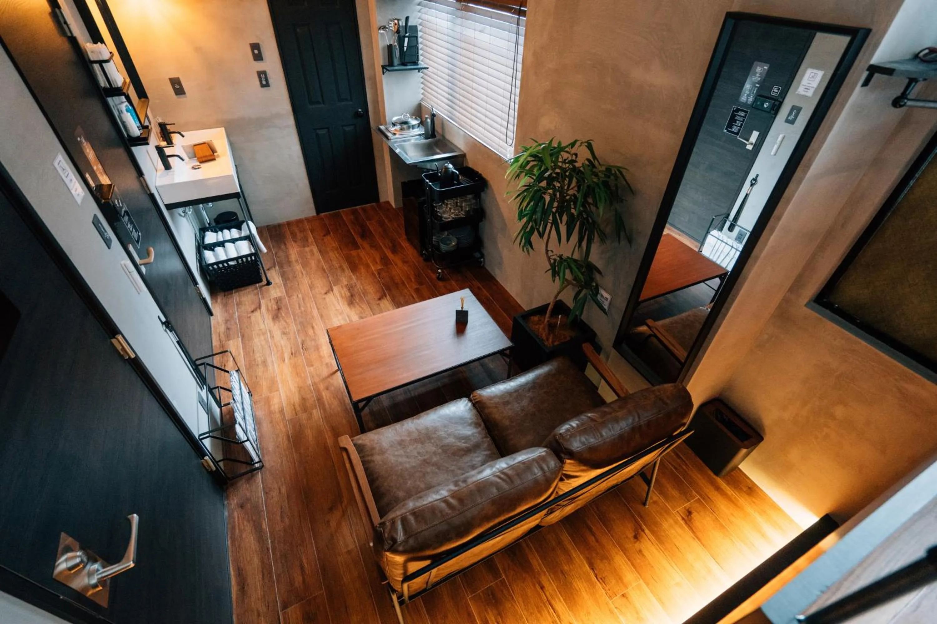 Seating area in mizuka Nakasu 1 - unmanned hotel -