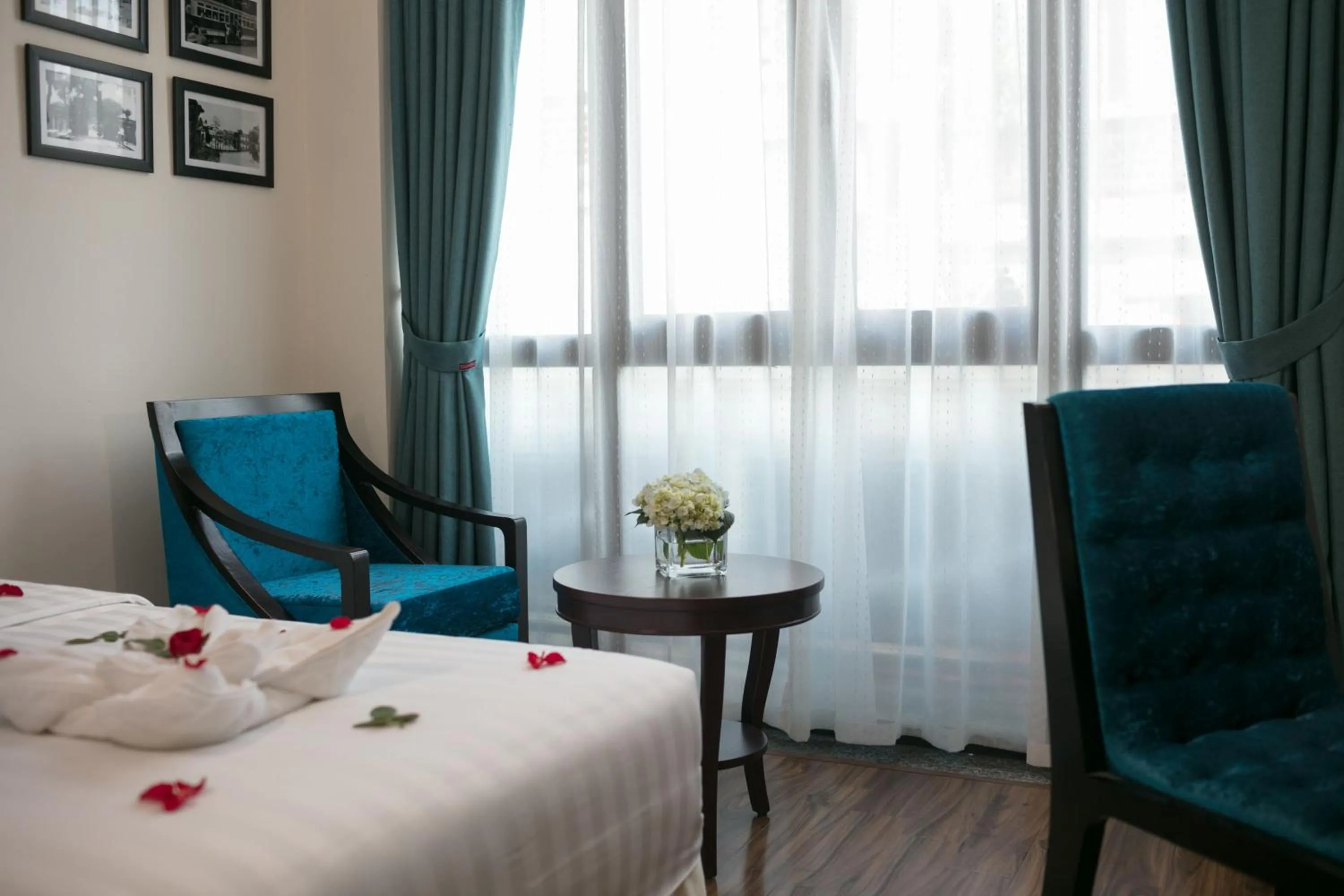 Seating area, Bed in Serene Boutique Hotel & Spa