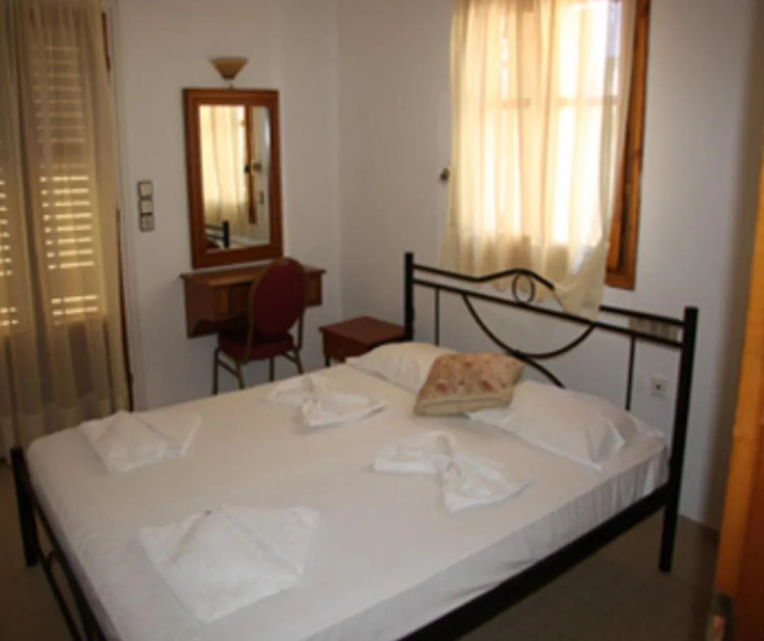 Bed in Dimitris Apartments