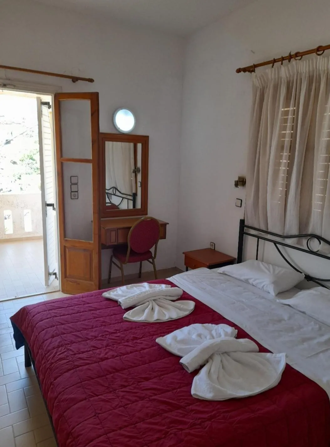 Bed in Dimitris Apartments