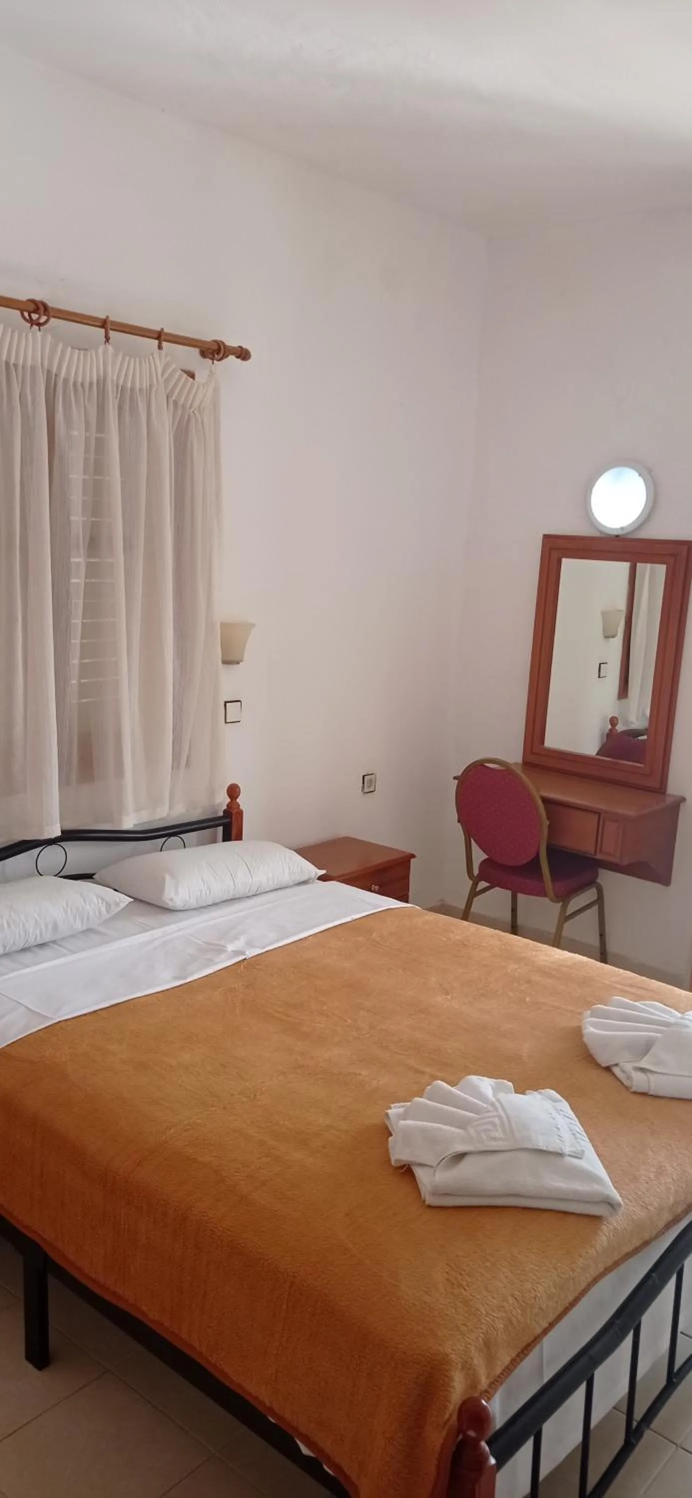 Bed in Dimitris Apartments