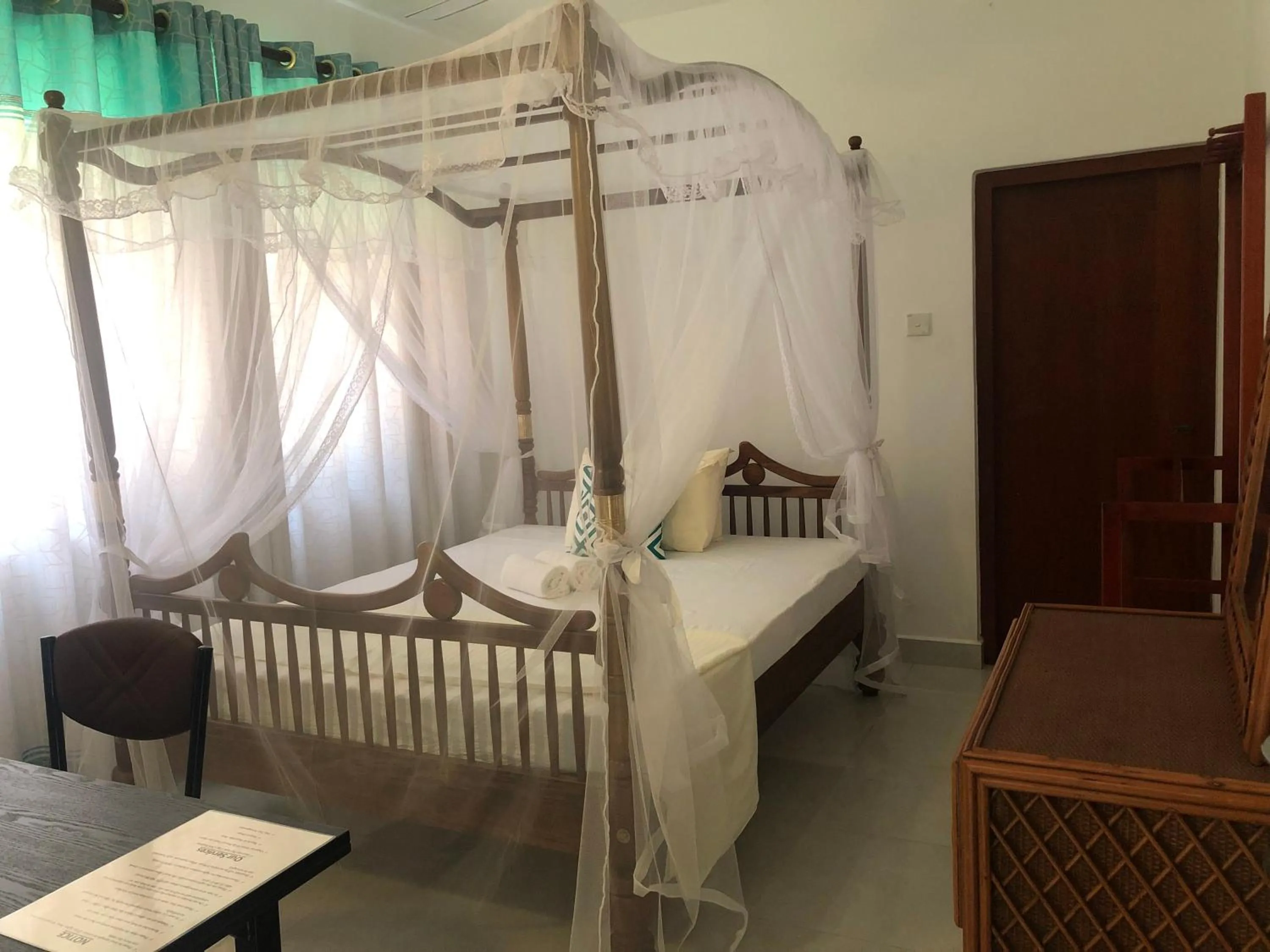 Bed in The Retreat Hotel