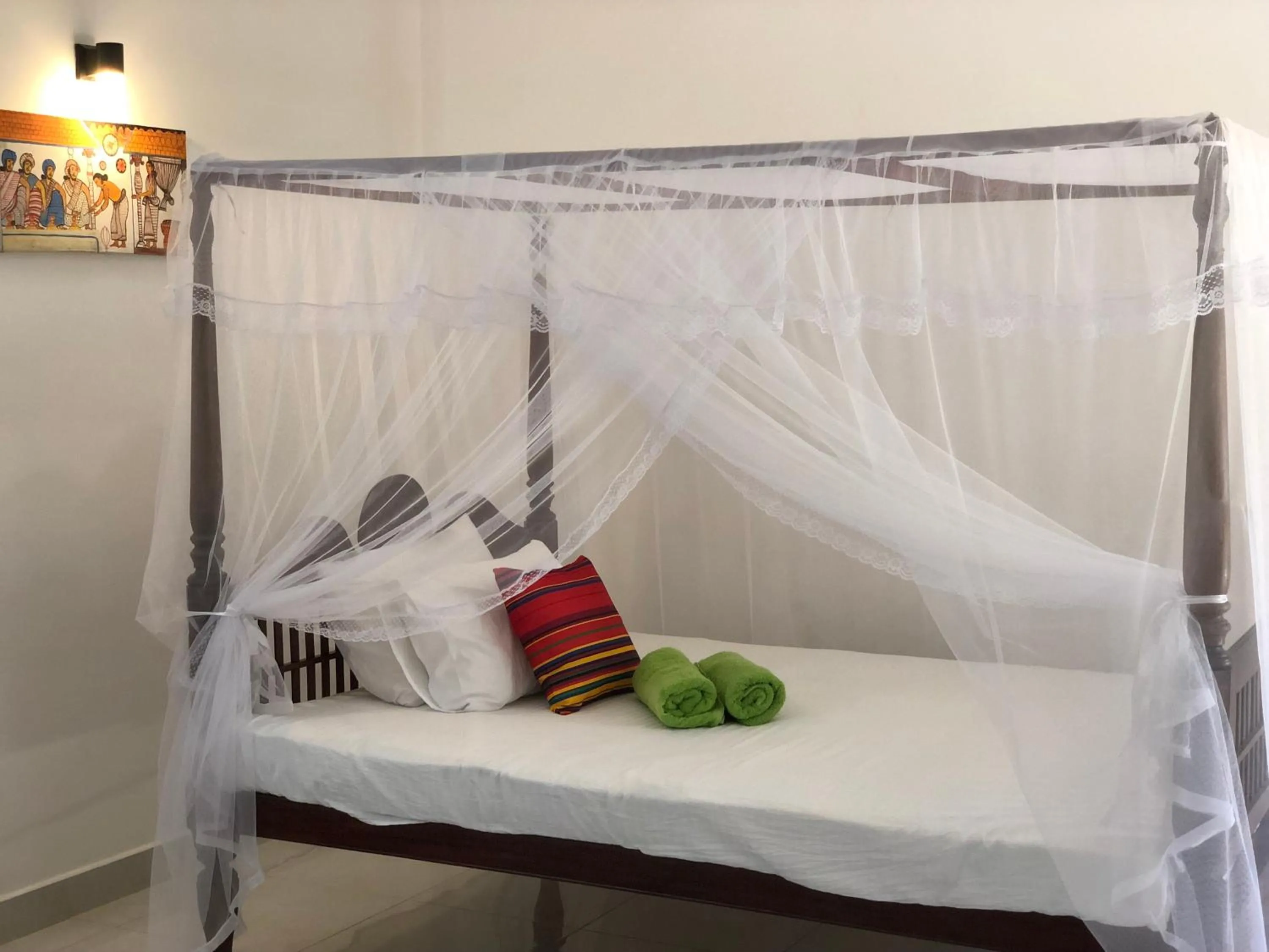 Bed in The Retreat Hotel