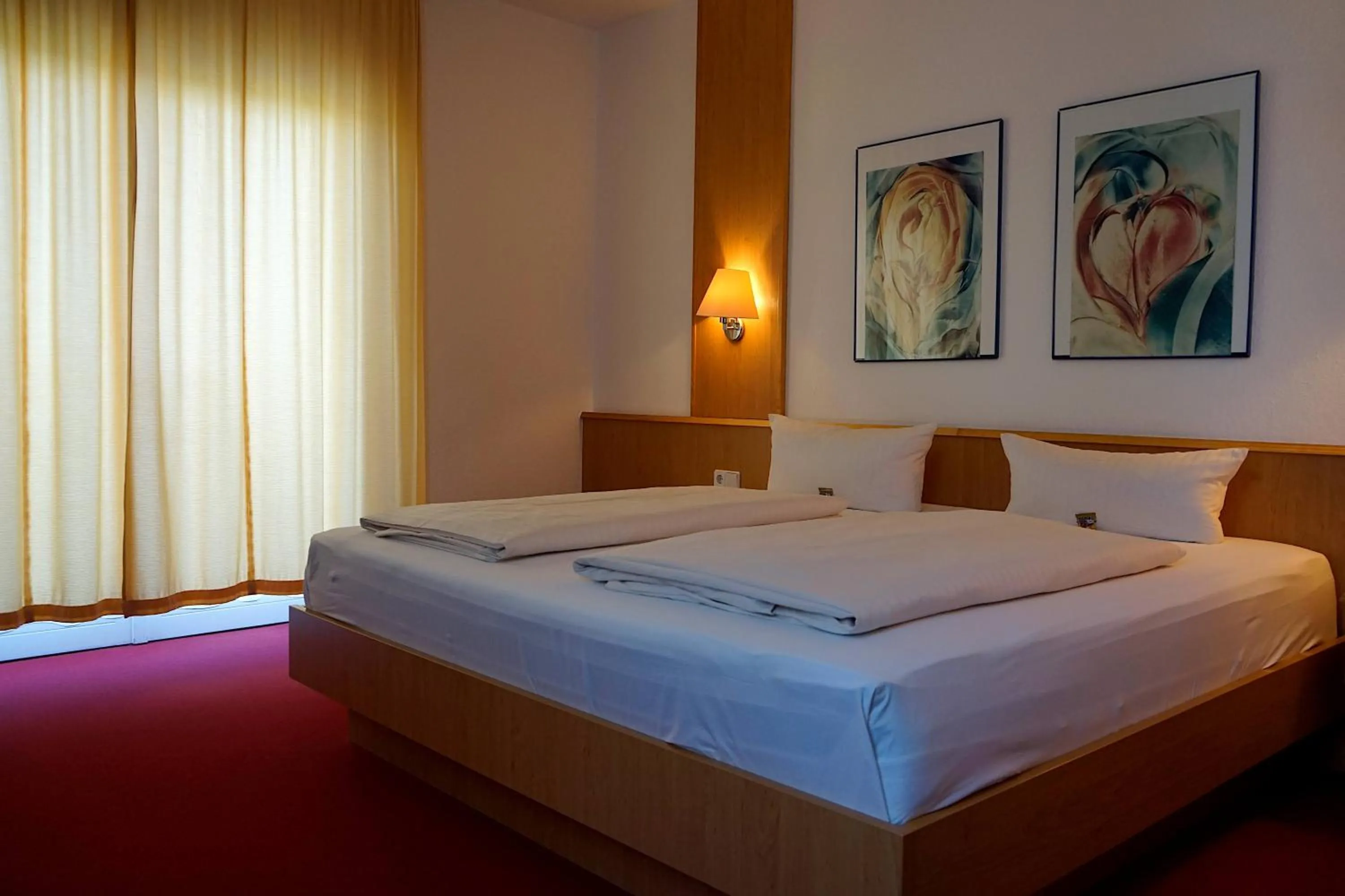 Photo of the whole room, Bed in Hainberg Hotel Garni