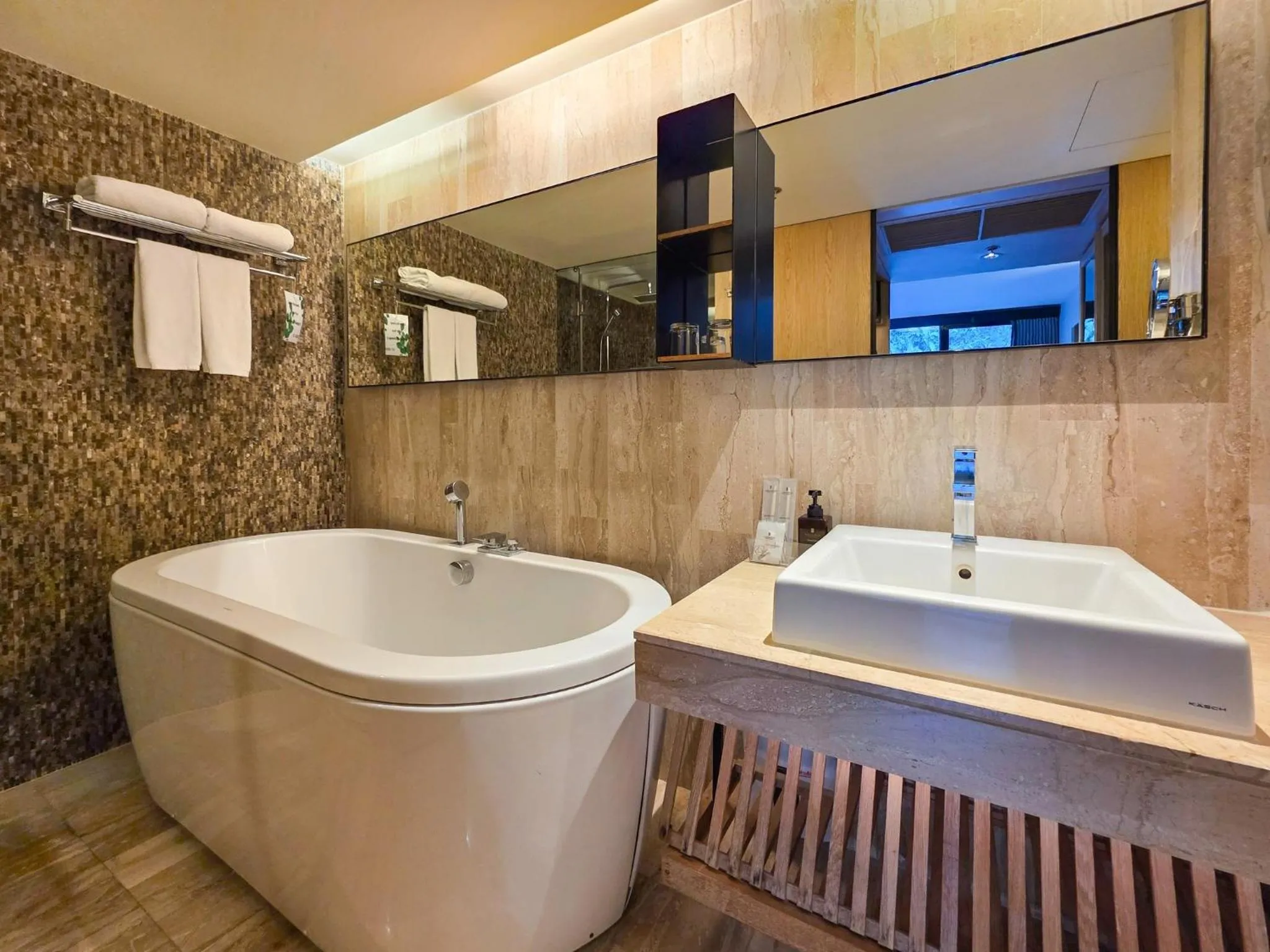 Bathroom in Arcadia Suites Bangkok