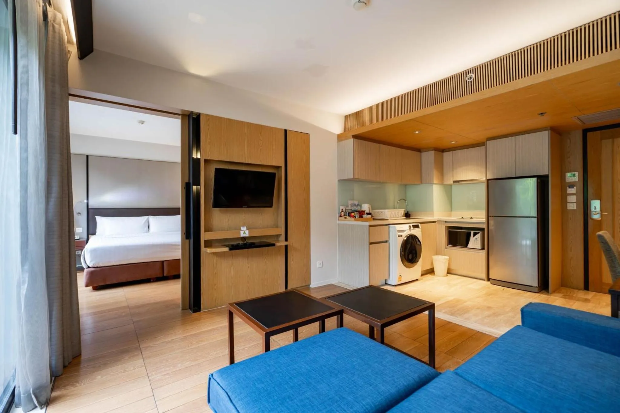 Kitchen or kitchenette, Bed in Arcadia Suites Bangkok