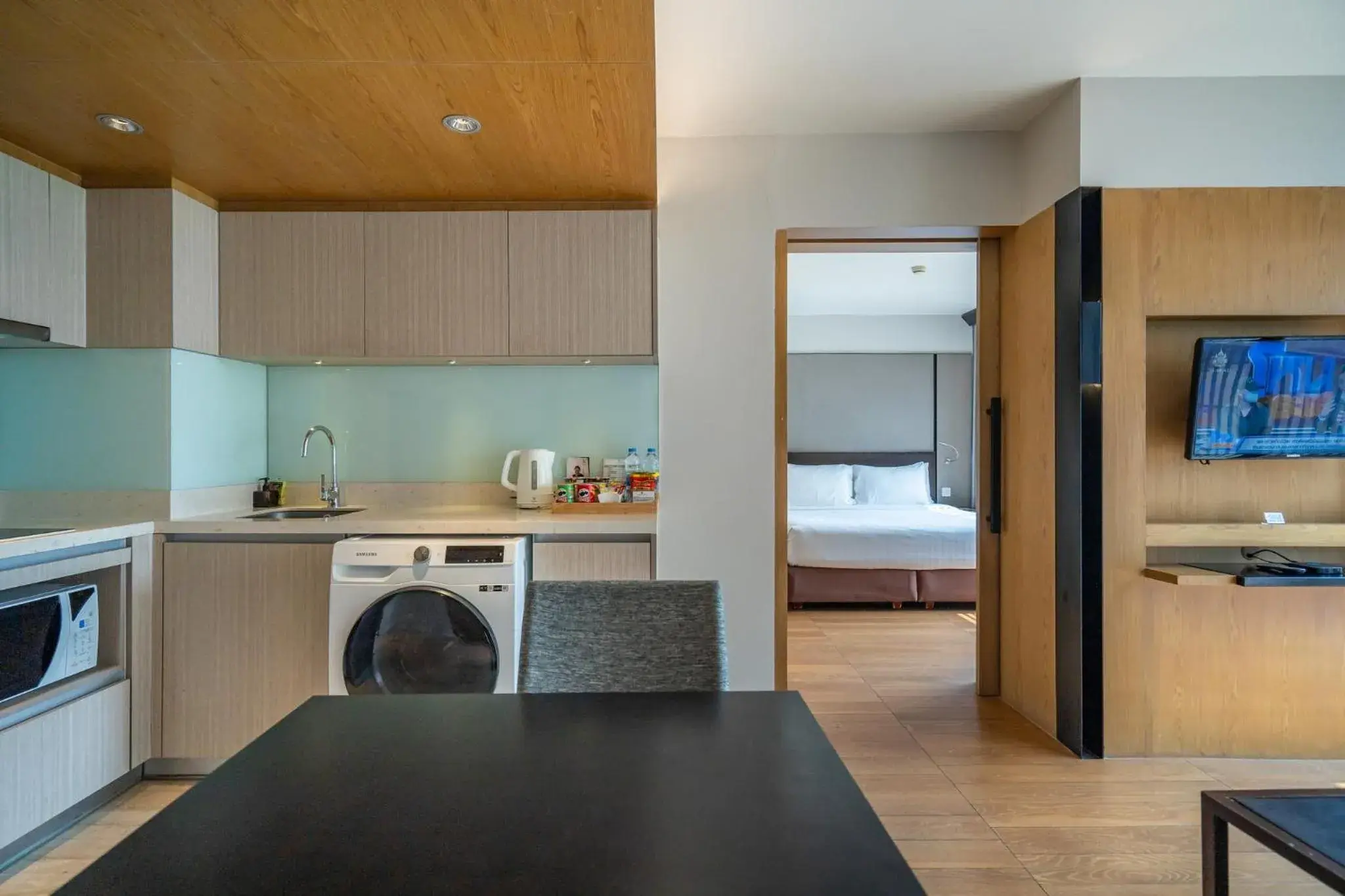 Living room, Bed in Arcadia Suites Bangkok Living room, Bed in Arcadia Suites Bangkok