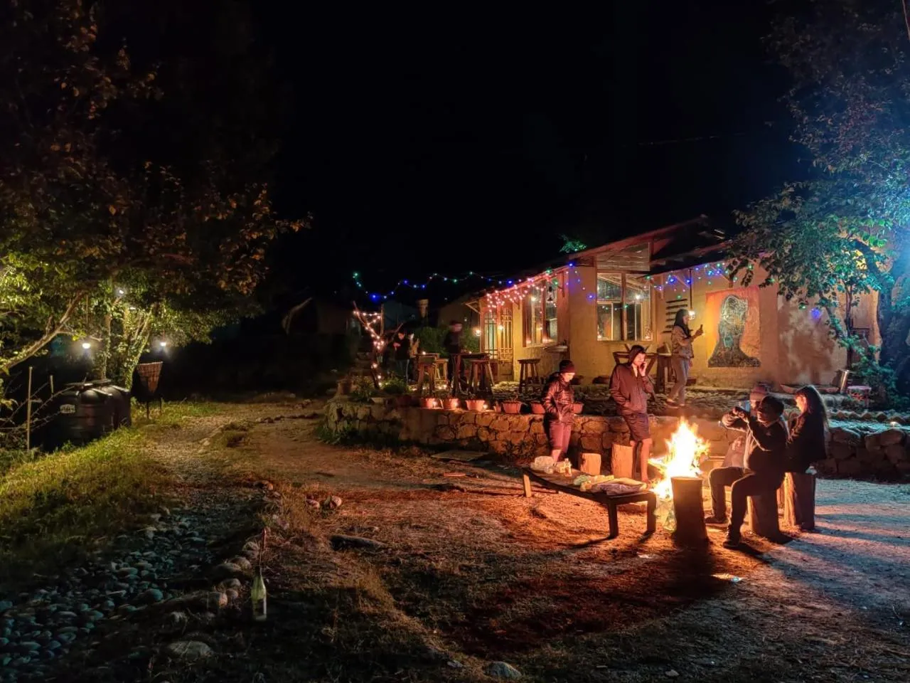 People in Monkey Mud House and Camps, Bir