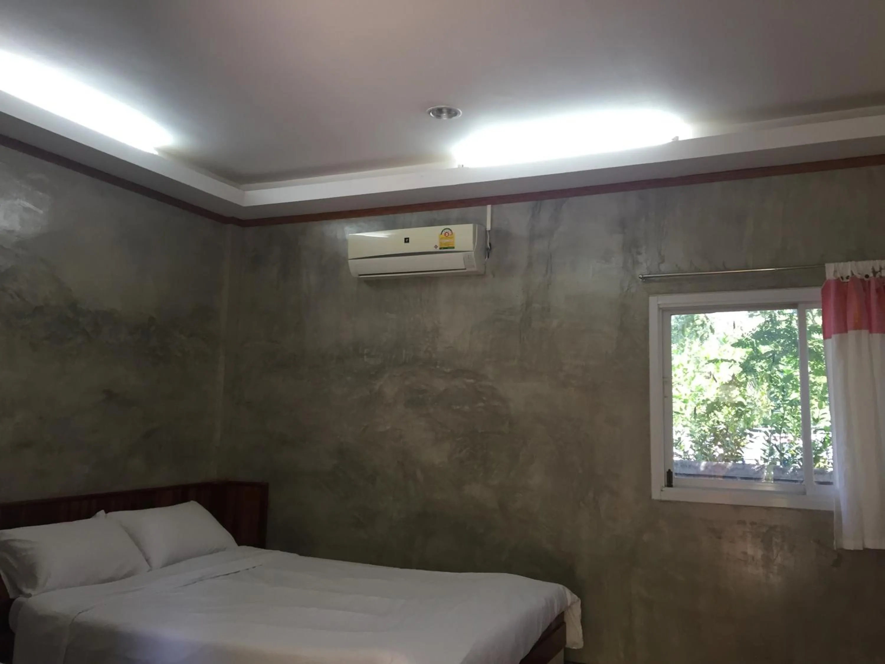 Bed in First Garden Home Resort