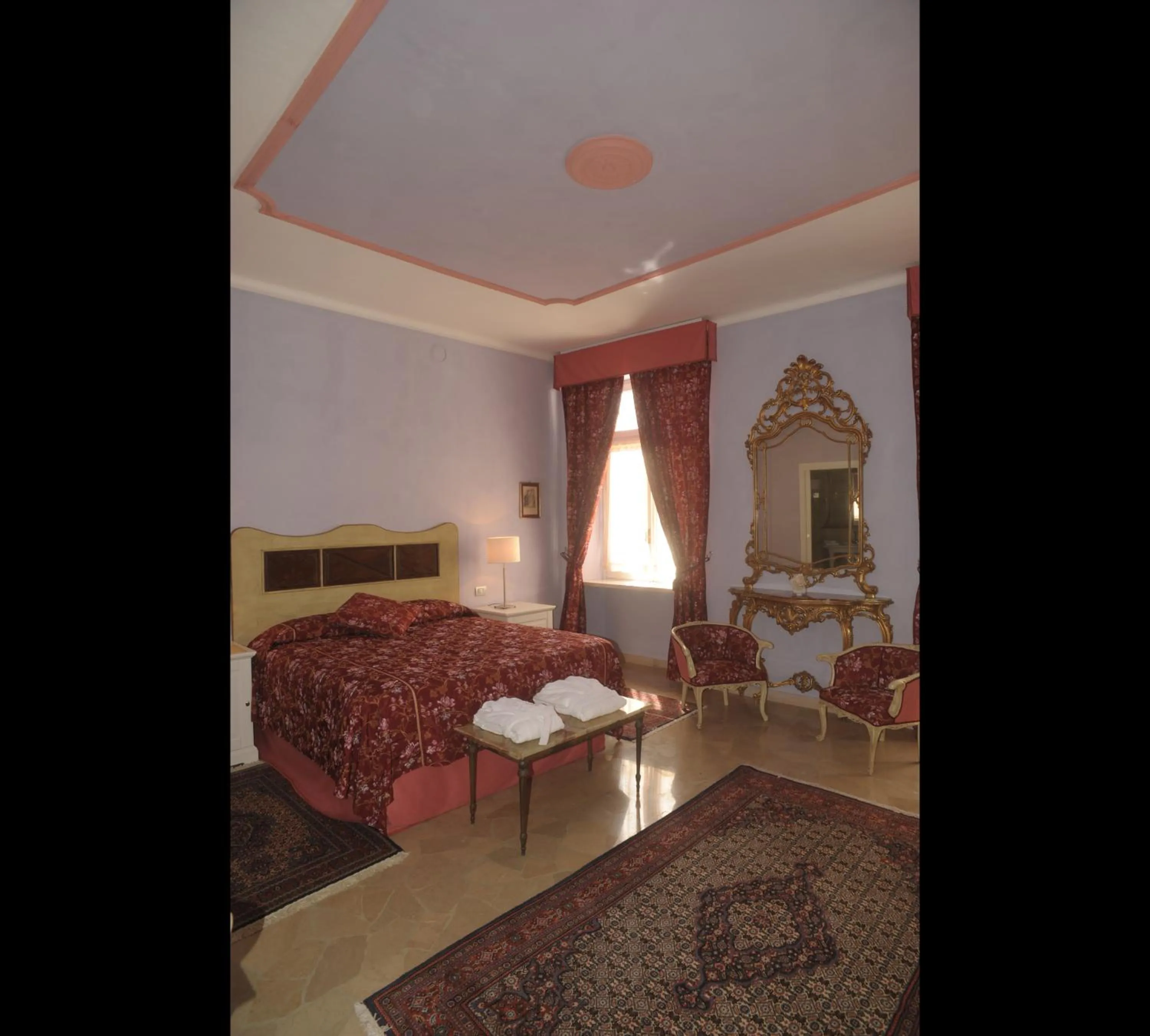 Bed in Relais Al Bel San Domenico