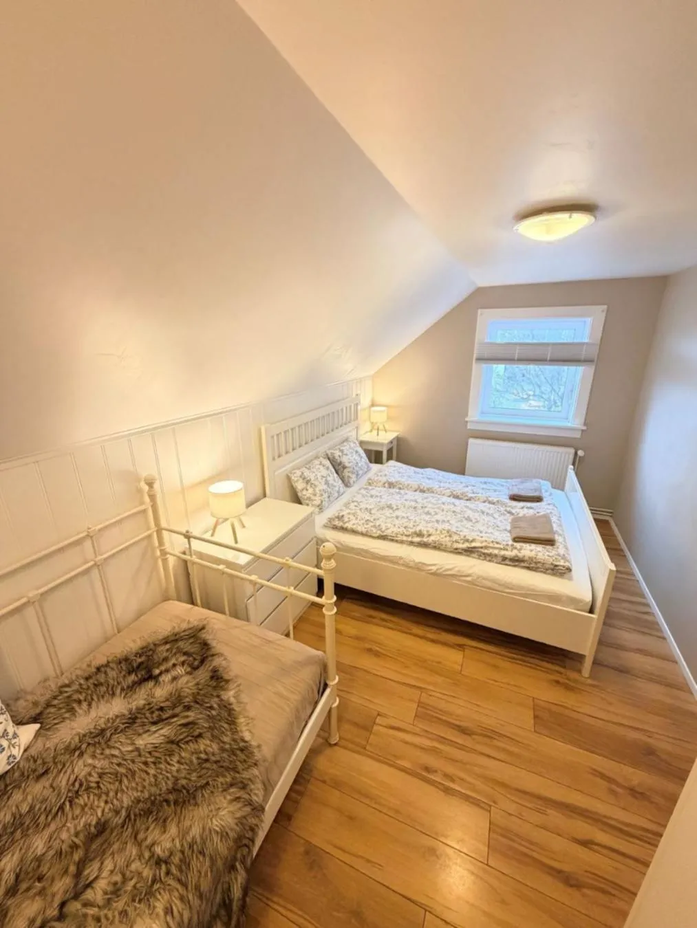 Bed in Eldstó Art Café Guesthouse