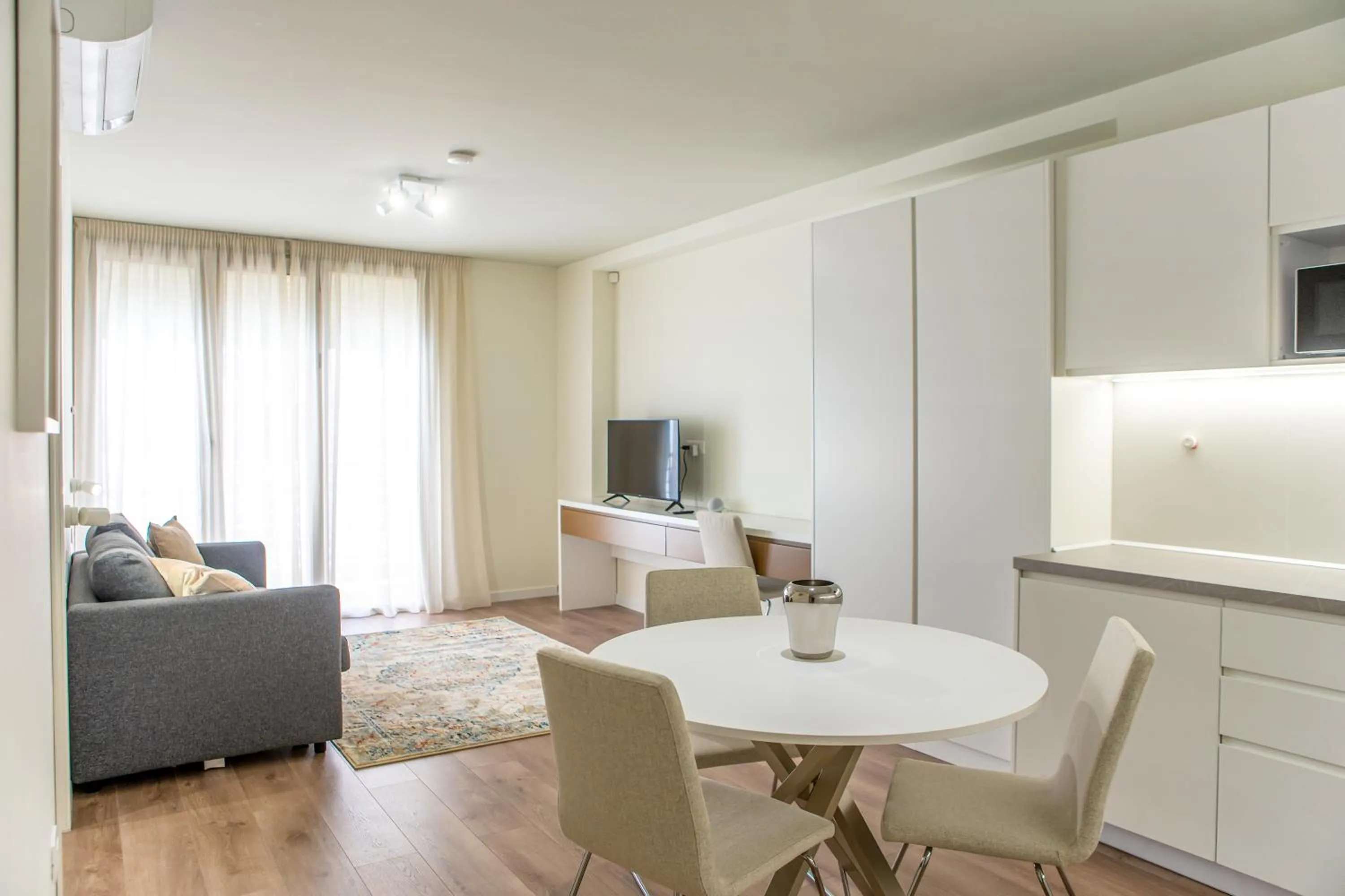 TV and multimedia in The Rooms Serviced Apartments Tirana