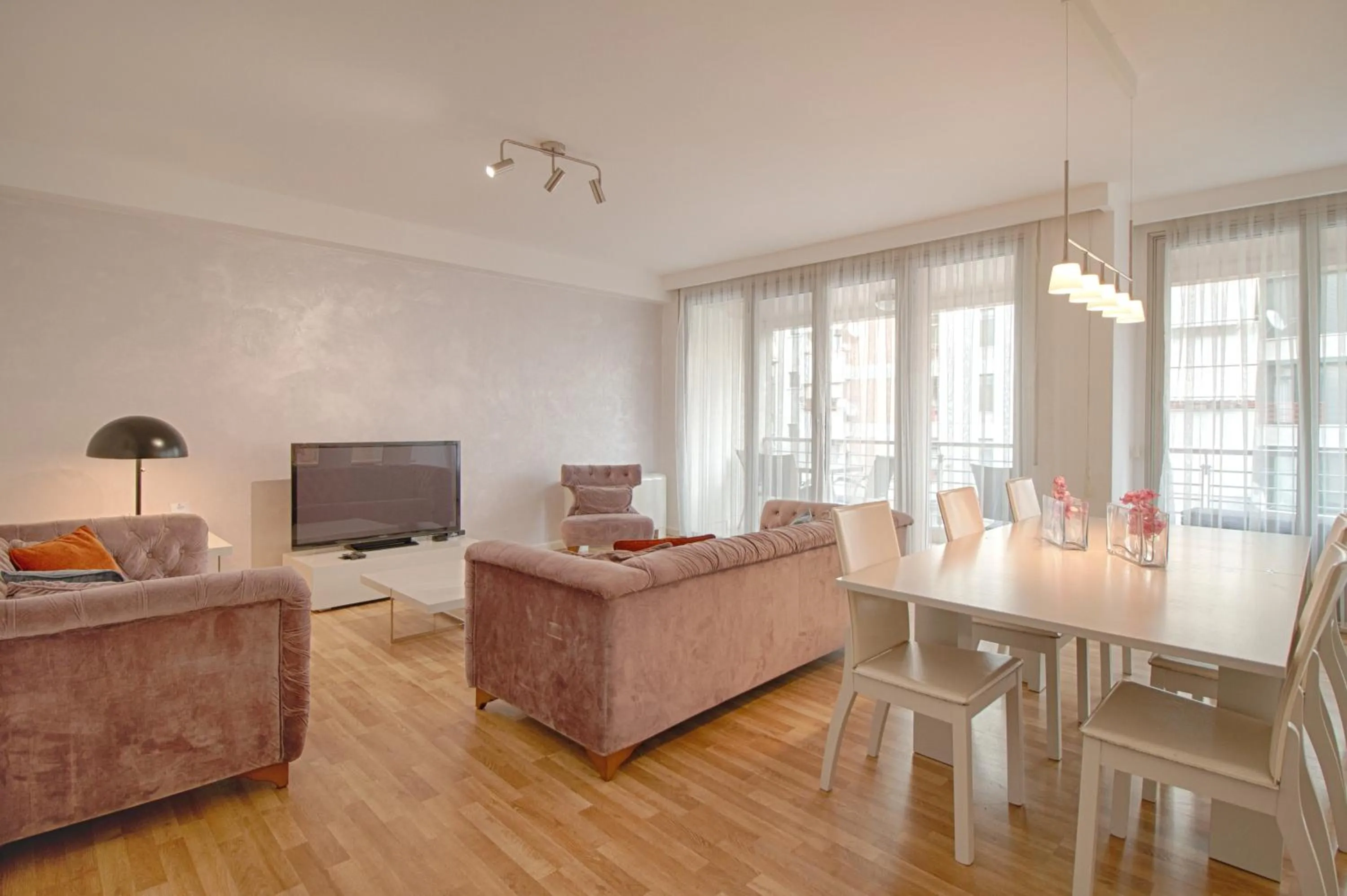 Communal lounge/ TV room in The Rooms Serviced Apartments Tirana