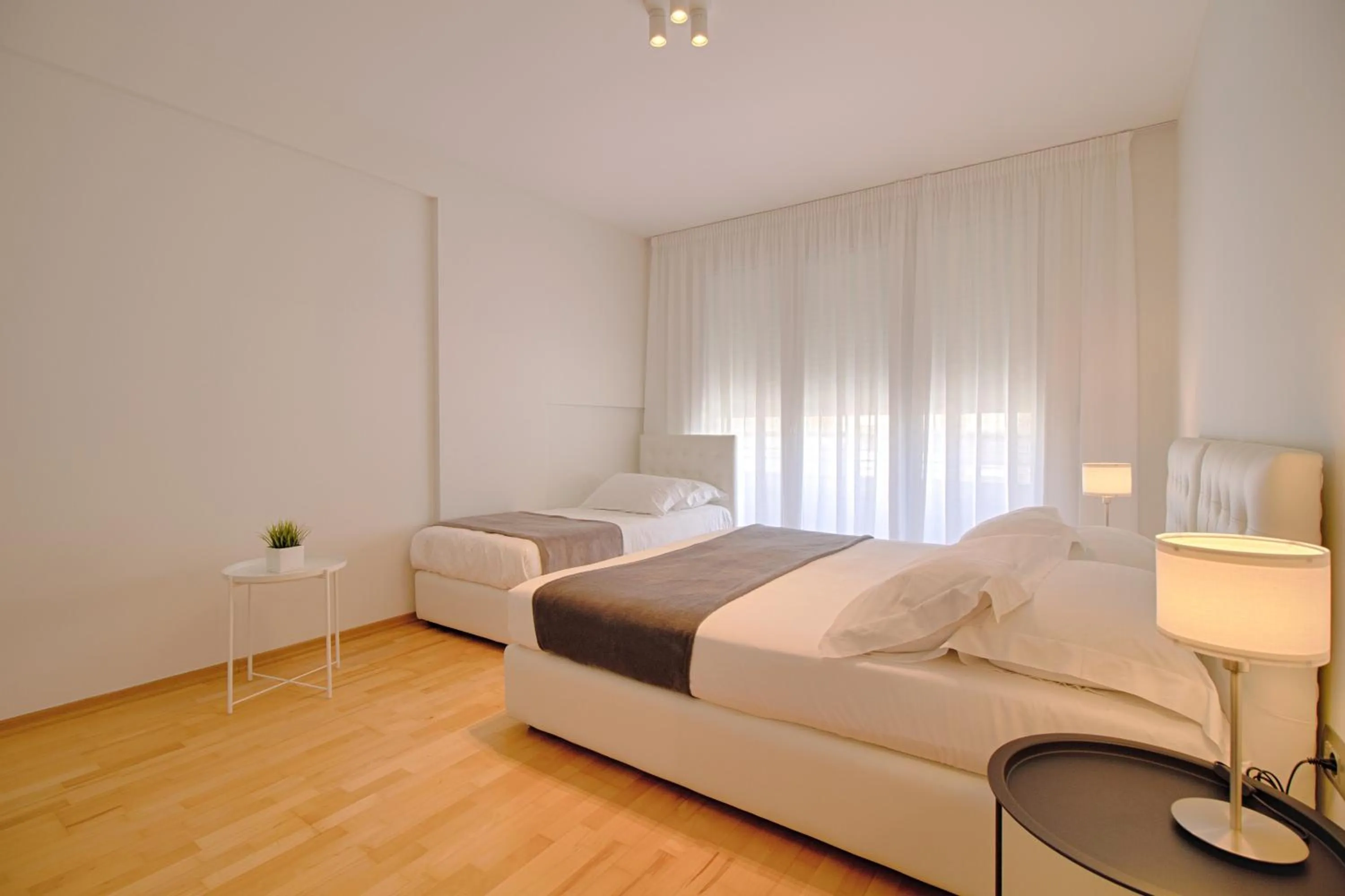 Bedroom, Bed in The Rooms Serviced Apartments Tirana