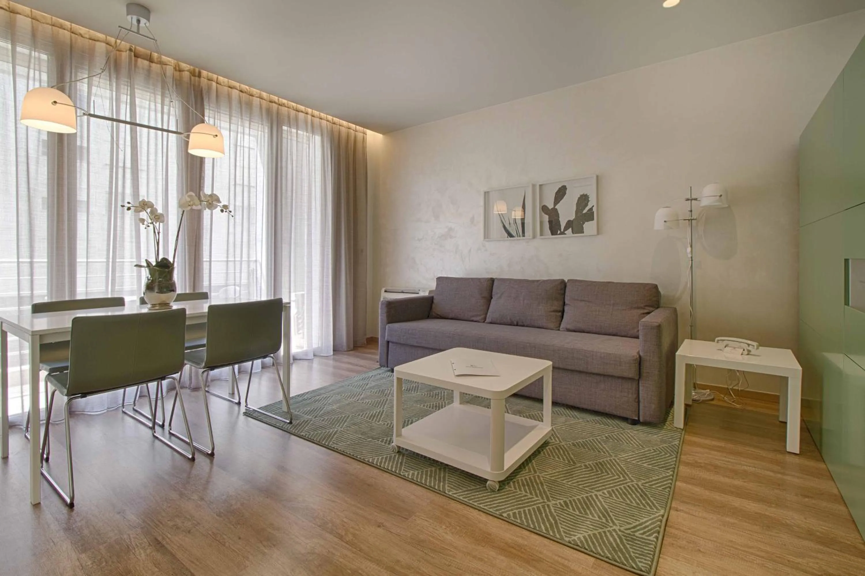 TV and multimedia in The Rooms Serviced Apartments Tirana