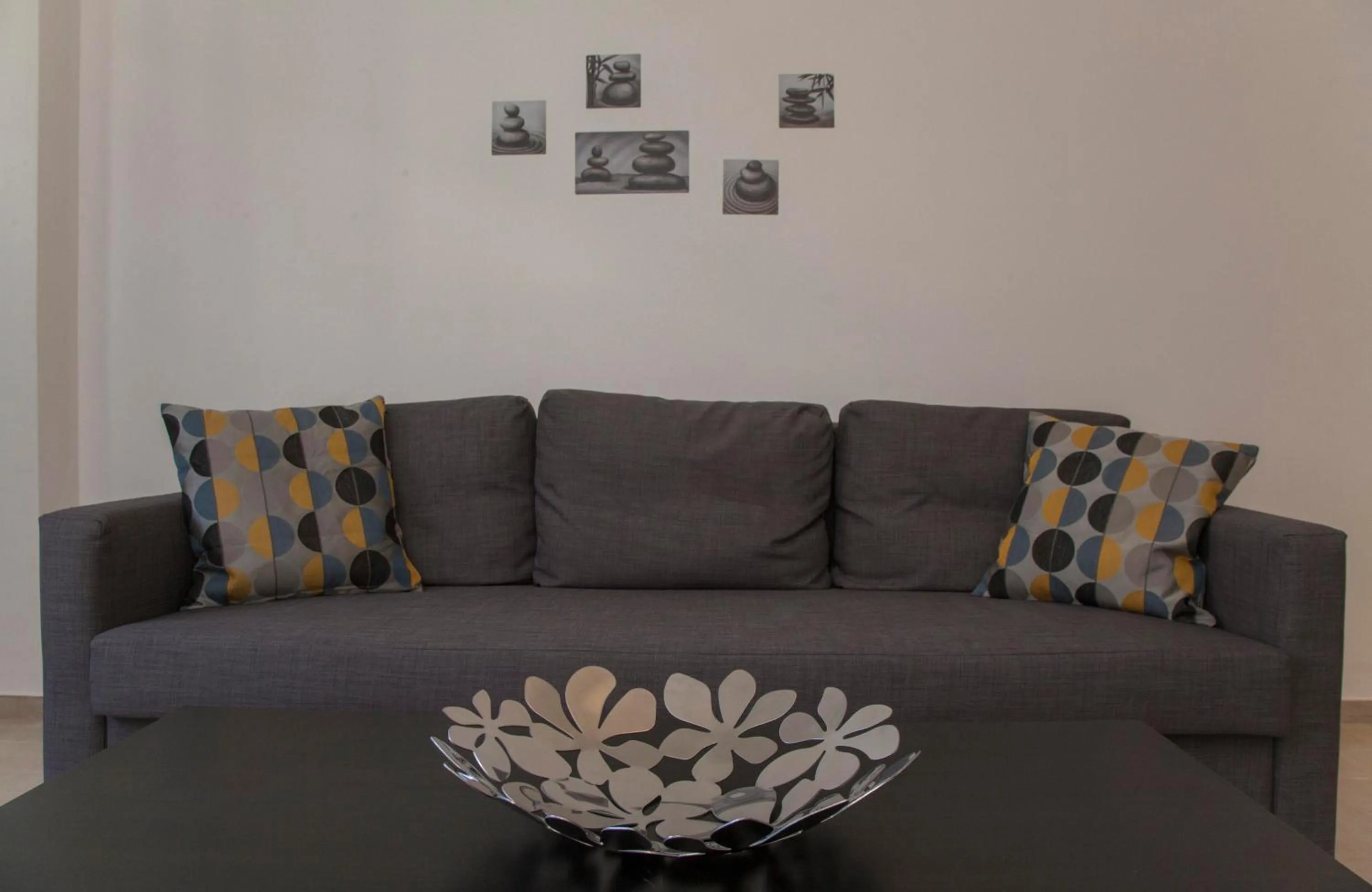 Seating area in Athens Jem near the Archaeological Museum by GHH