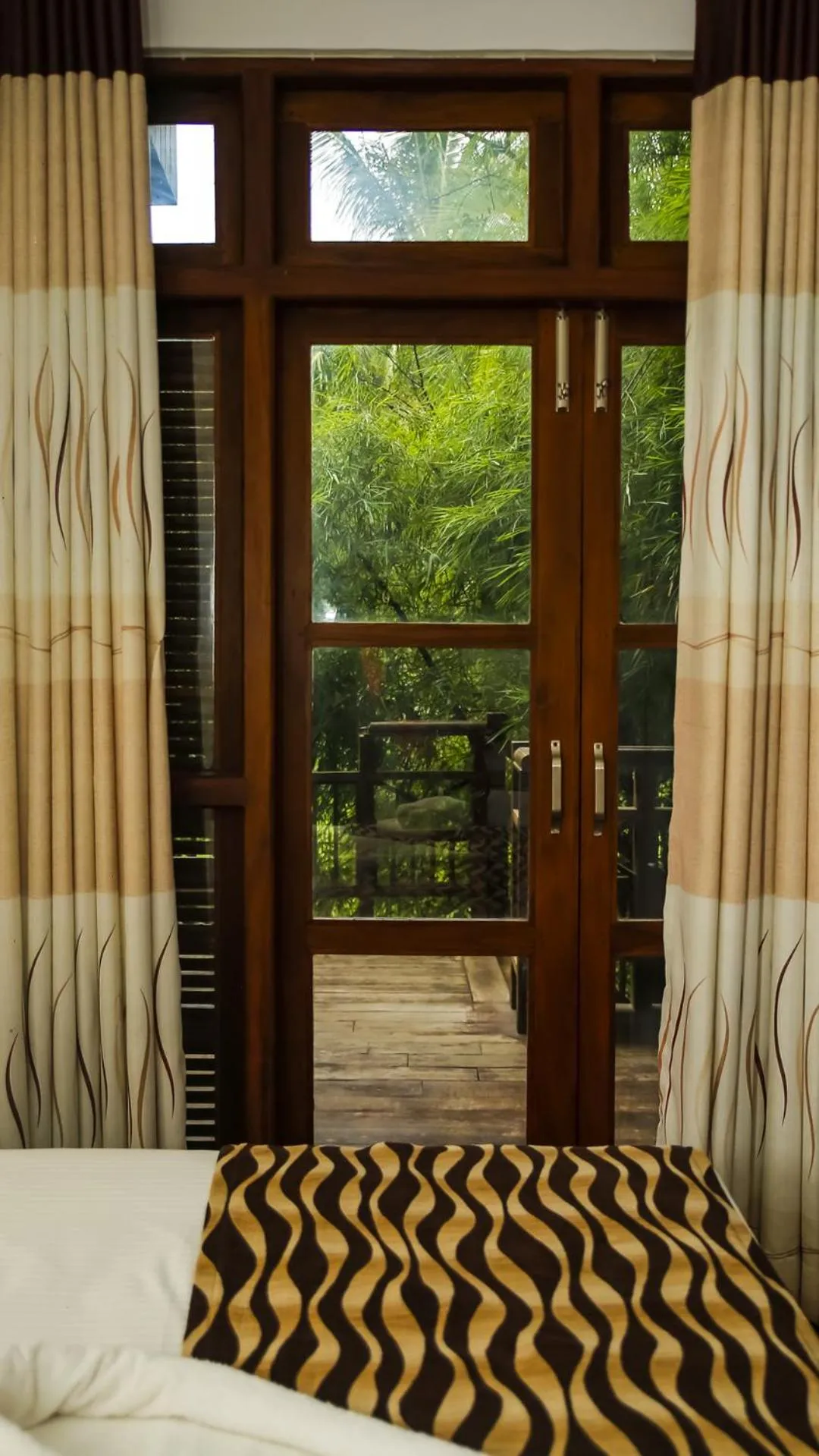 Garden view, Bed in Silver crown nature resort