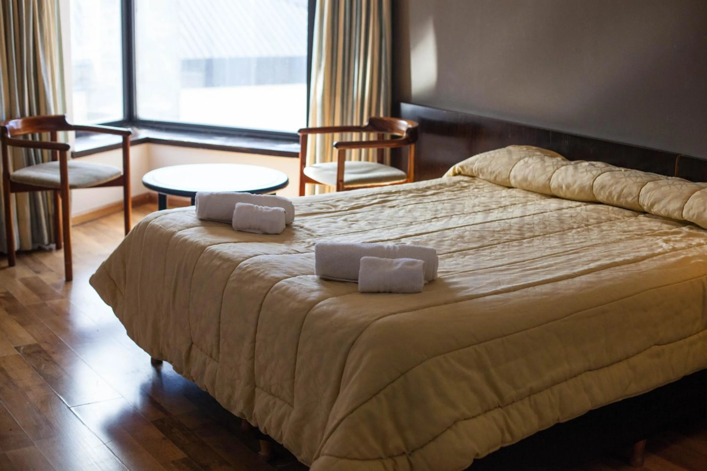 Photo of the whole room in HOTEL BARILOCHE CITY