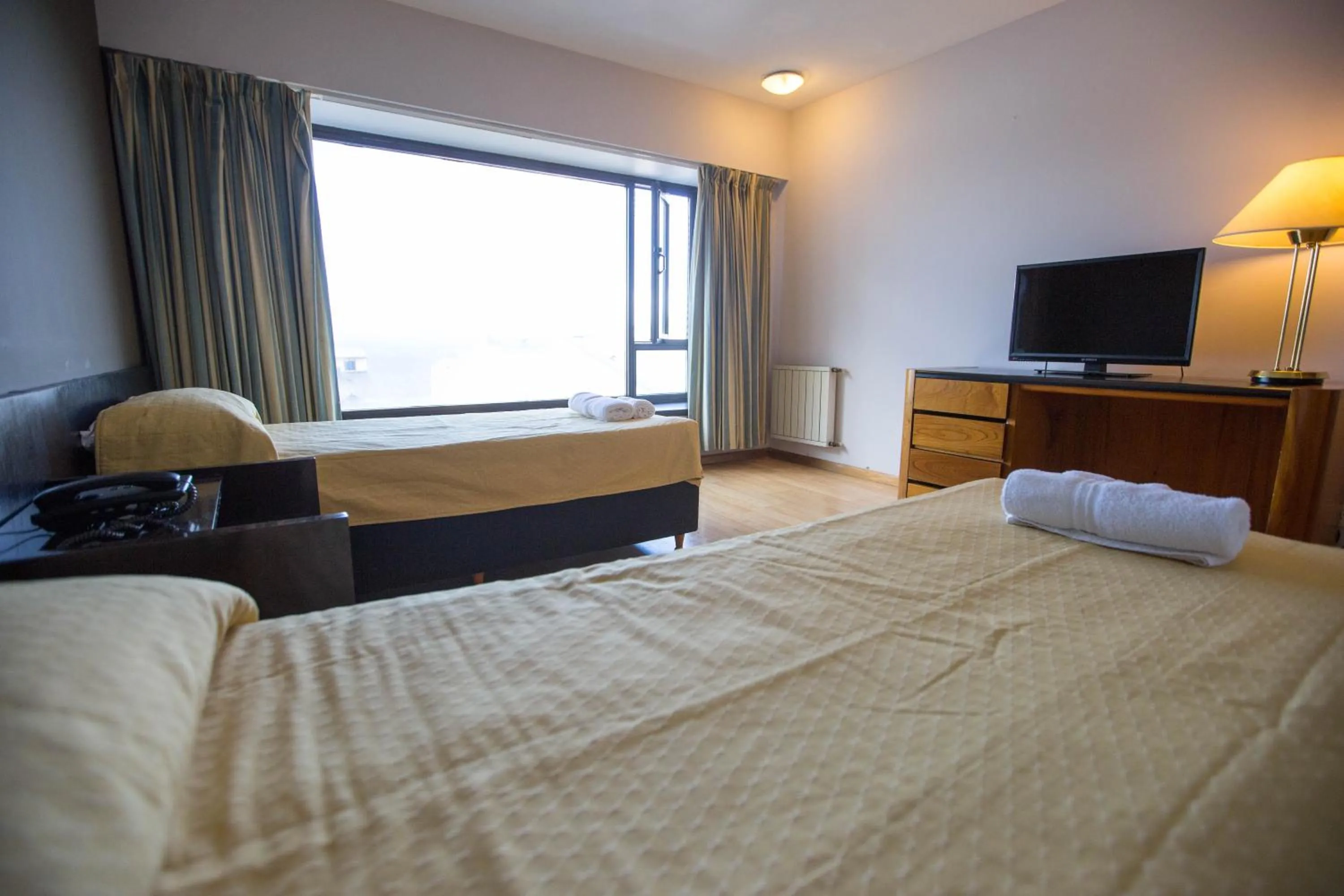 Photo of the whole room in HOTEL BARILOCHE CITY