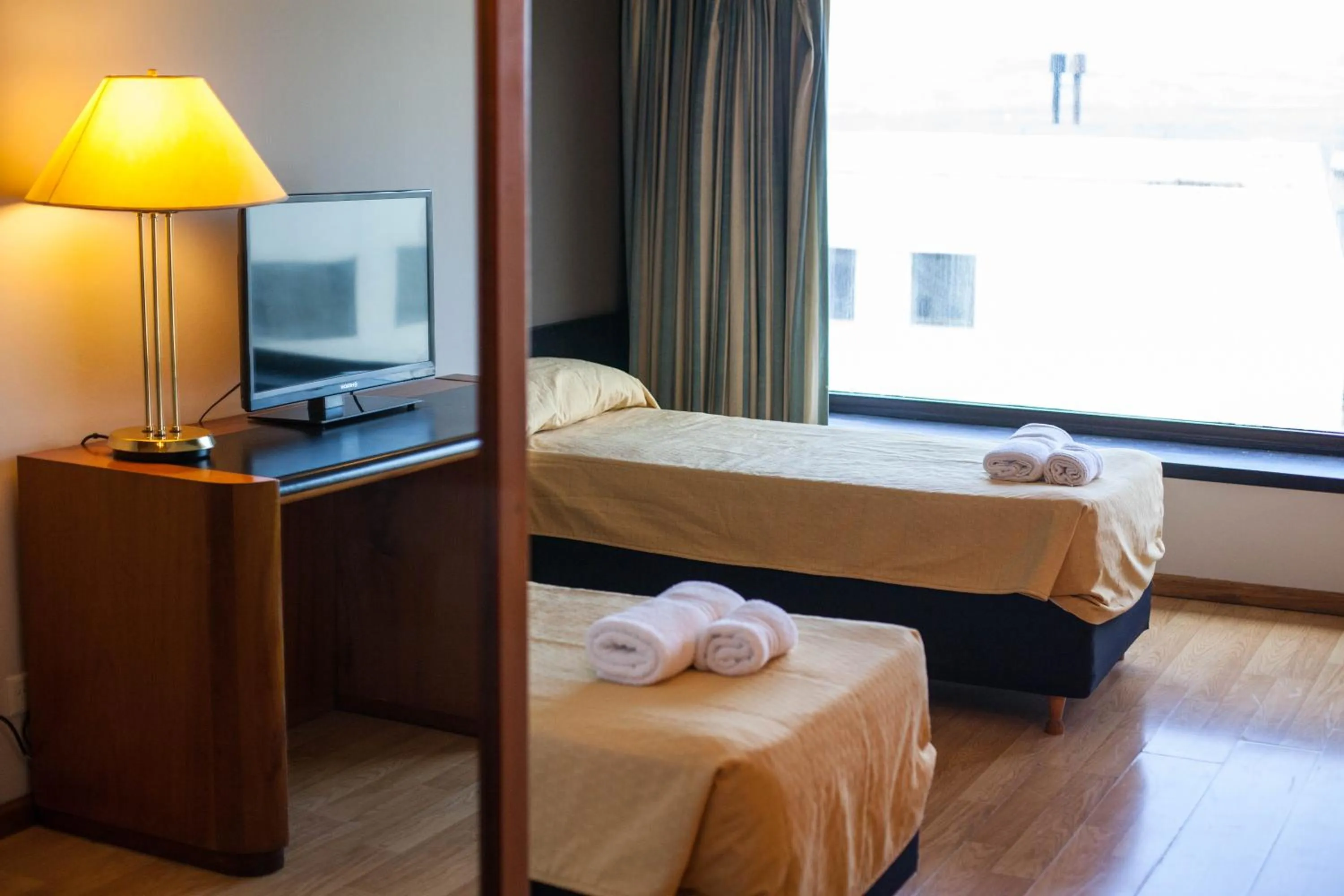 Photo of the whole room in HOTEL BARILOCHE CITY