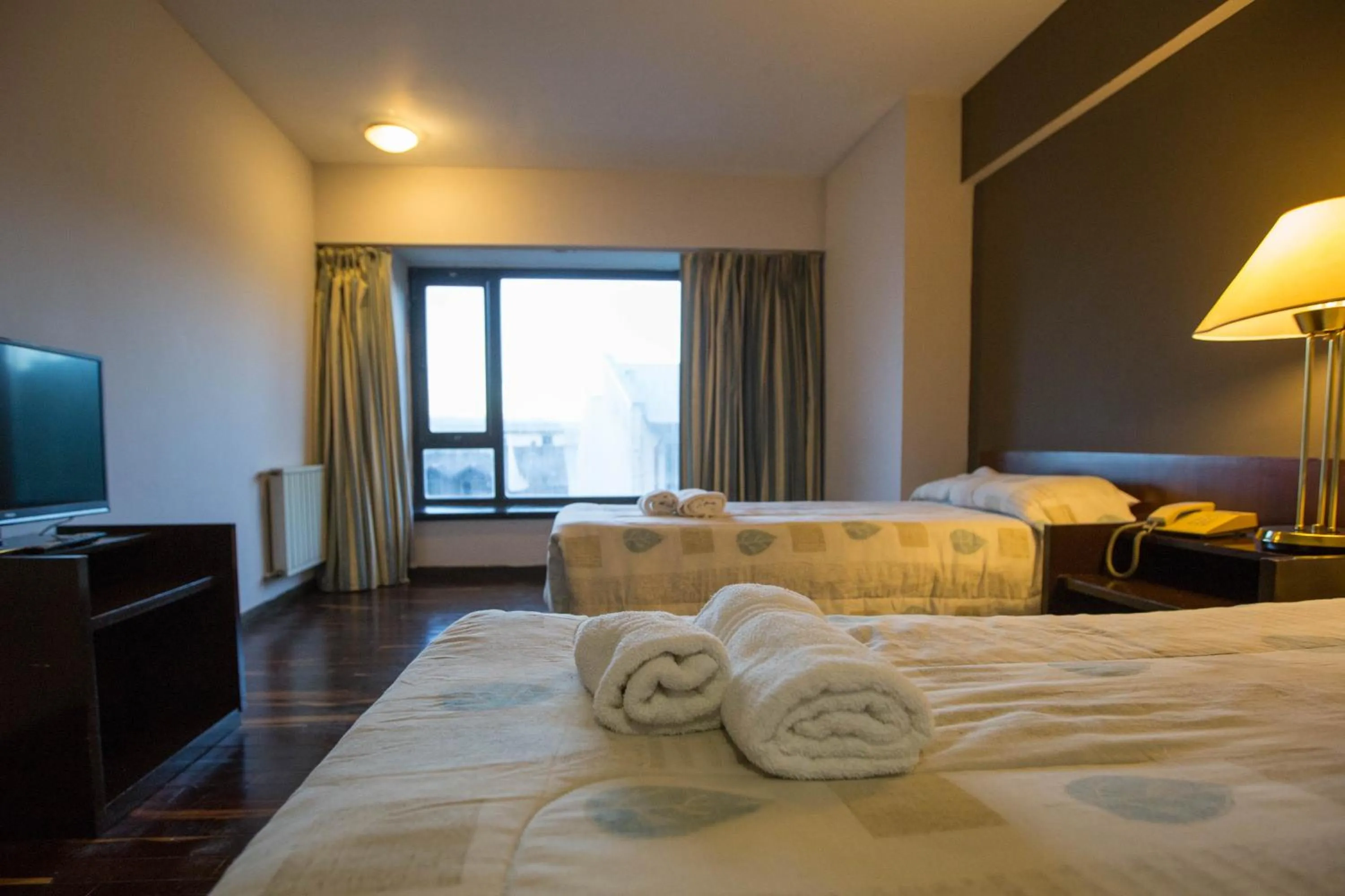 Photo of the whole room in HOTEL BARILOCHE CITY