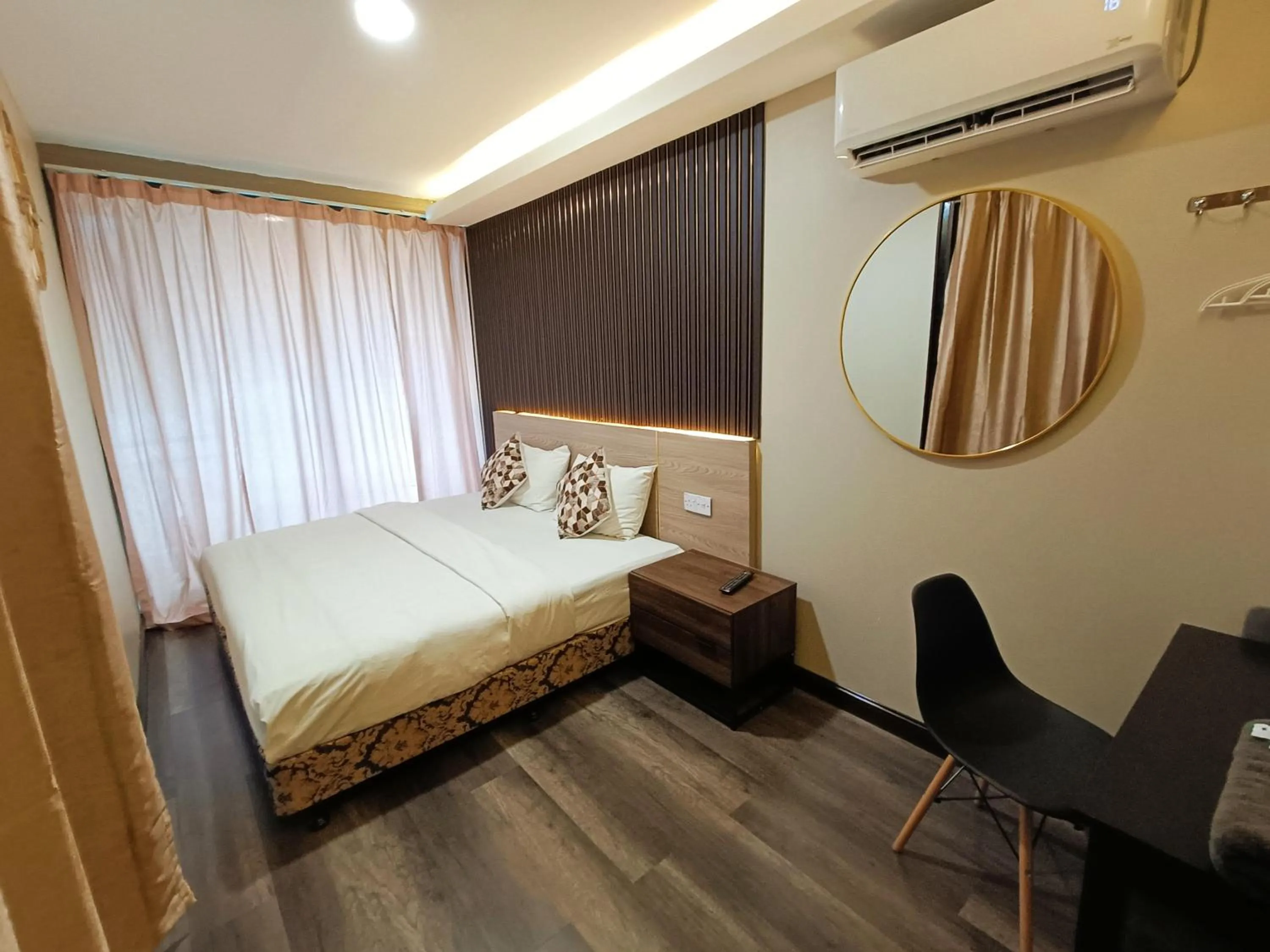 Bed in Tc theme park Guest house