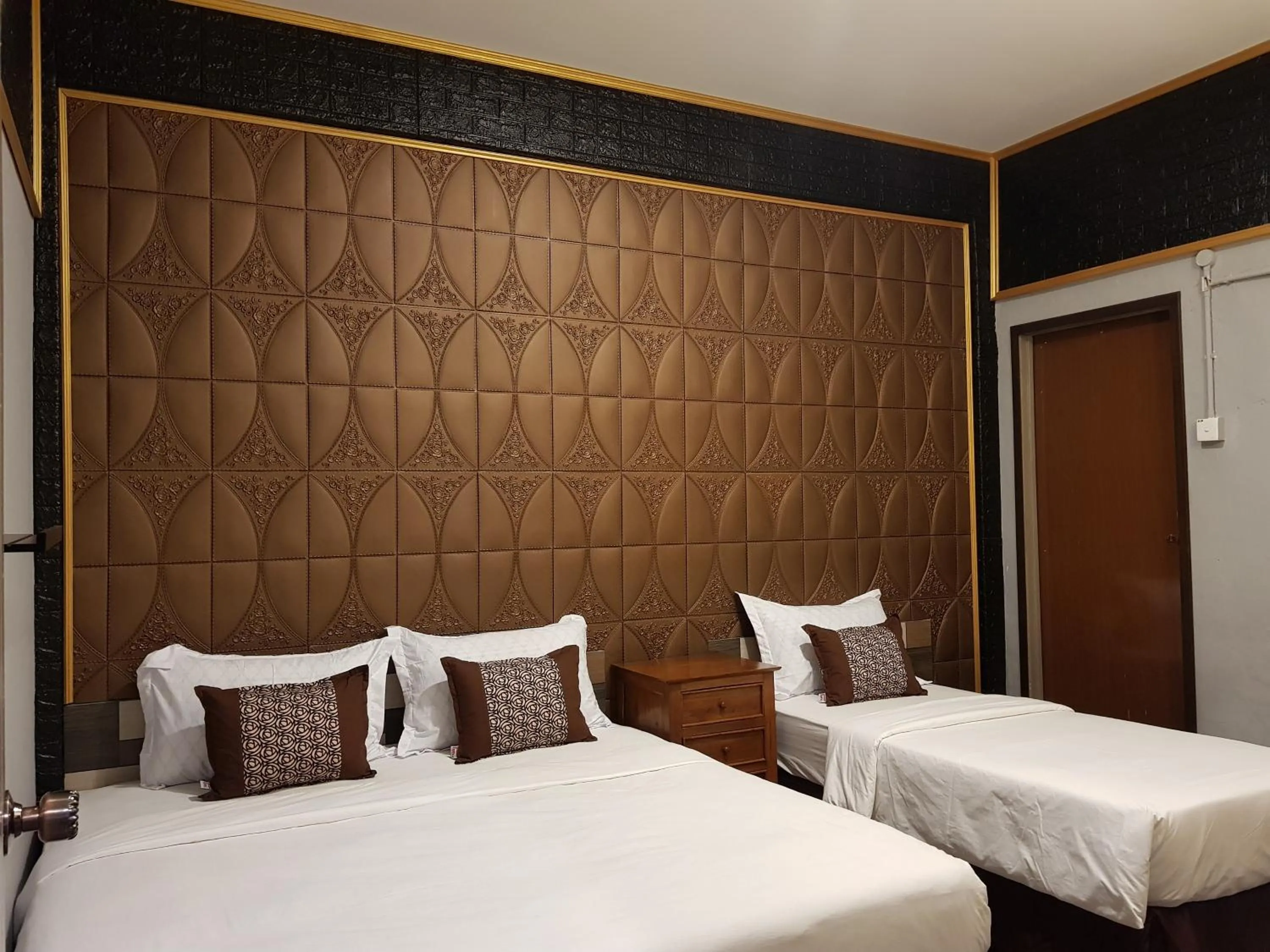 Bed in Tc theme park Guest house