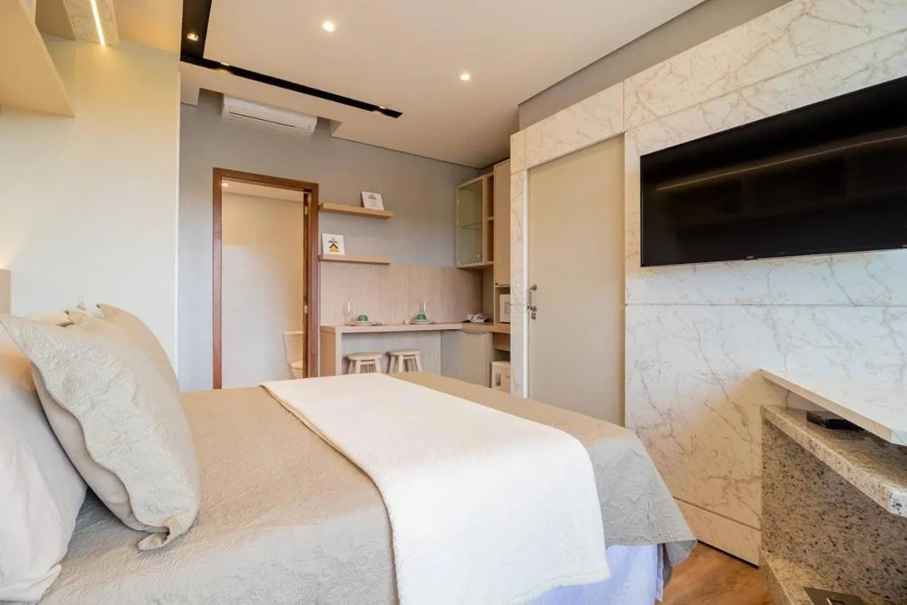 Bed in Pousada Natribus Rosa