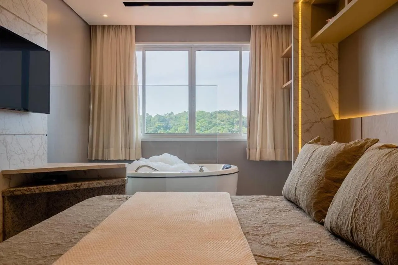 Bed in Pousada Natribus Rosa