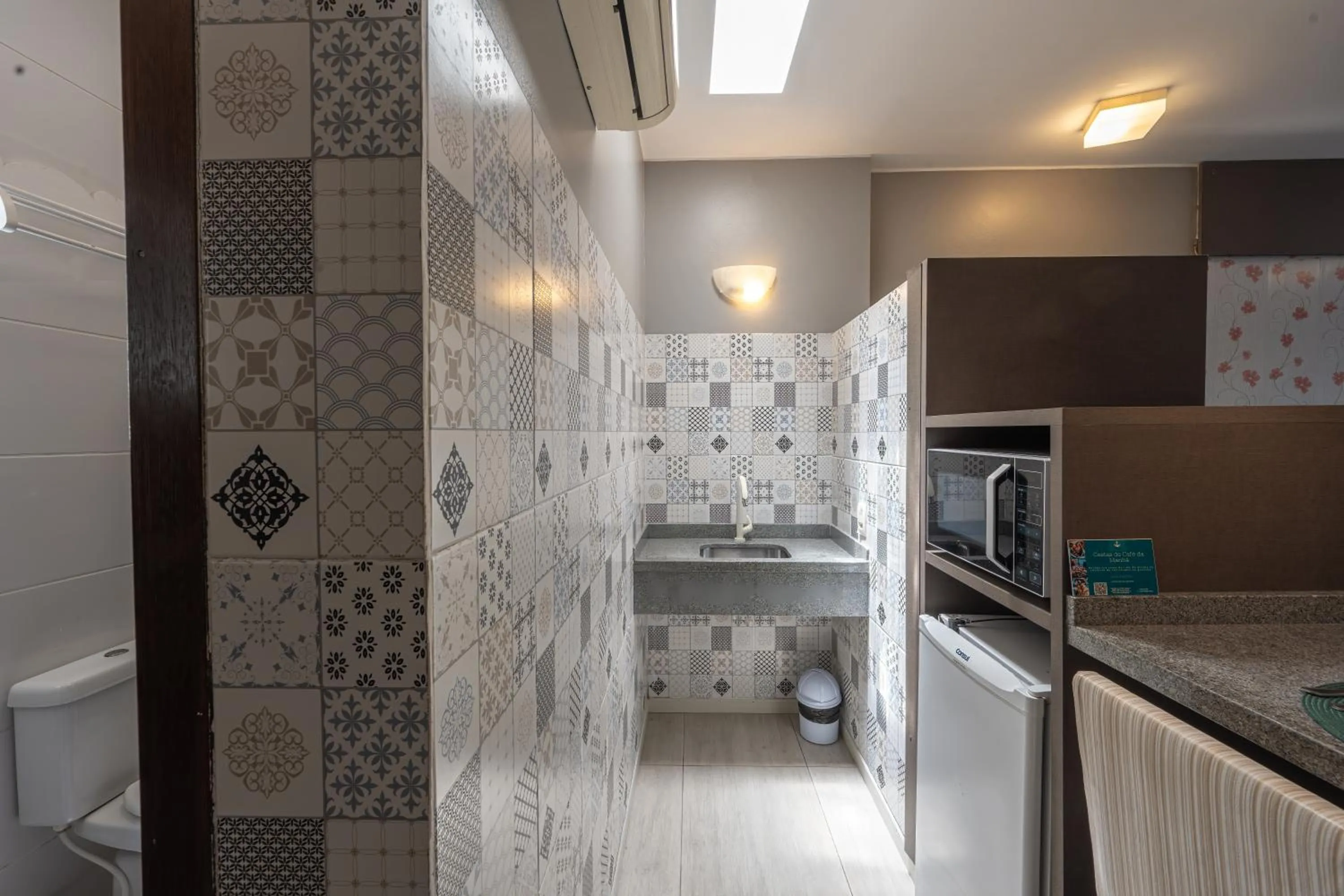 Kitchen or kitchenette in Pousada Natribus Rosa