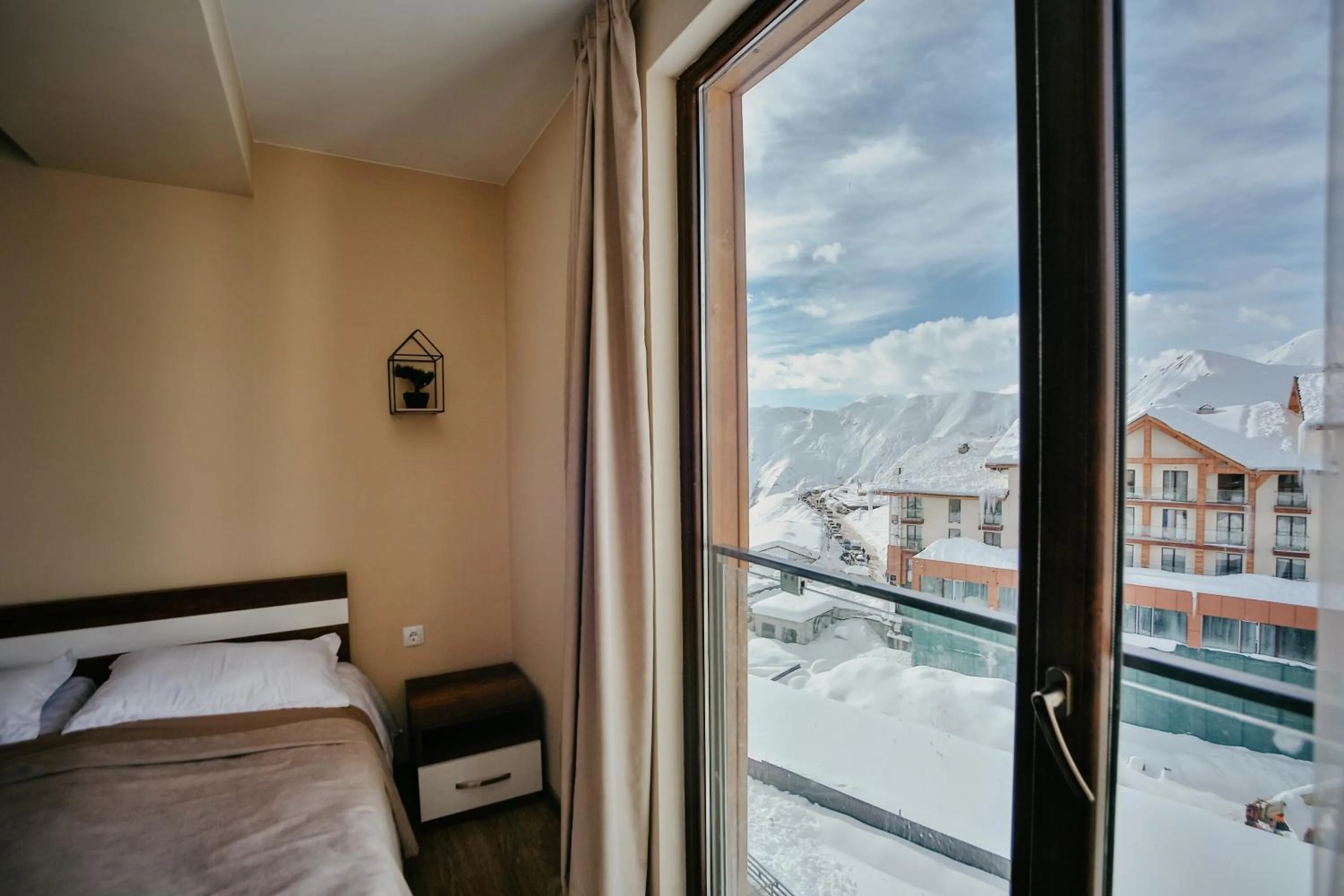 Bed in Maisako's New Gudauri Apartment