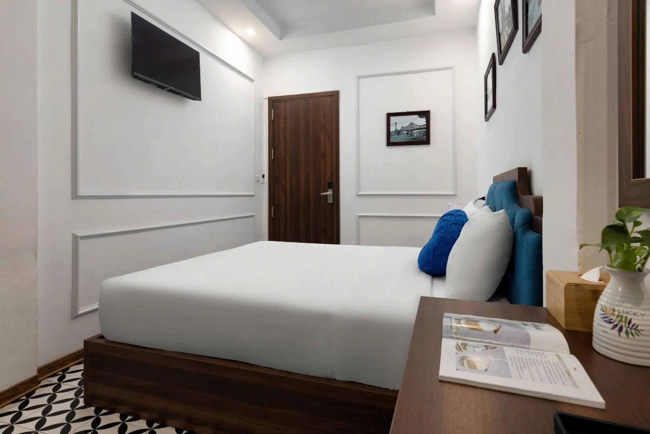 Photo of the whole room, Bed in The Ambery Hanoi Boutique Hotel & Travel