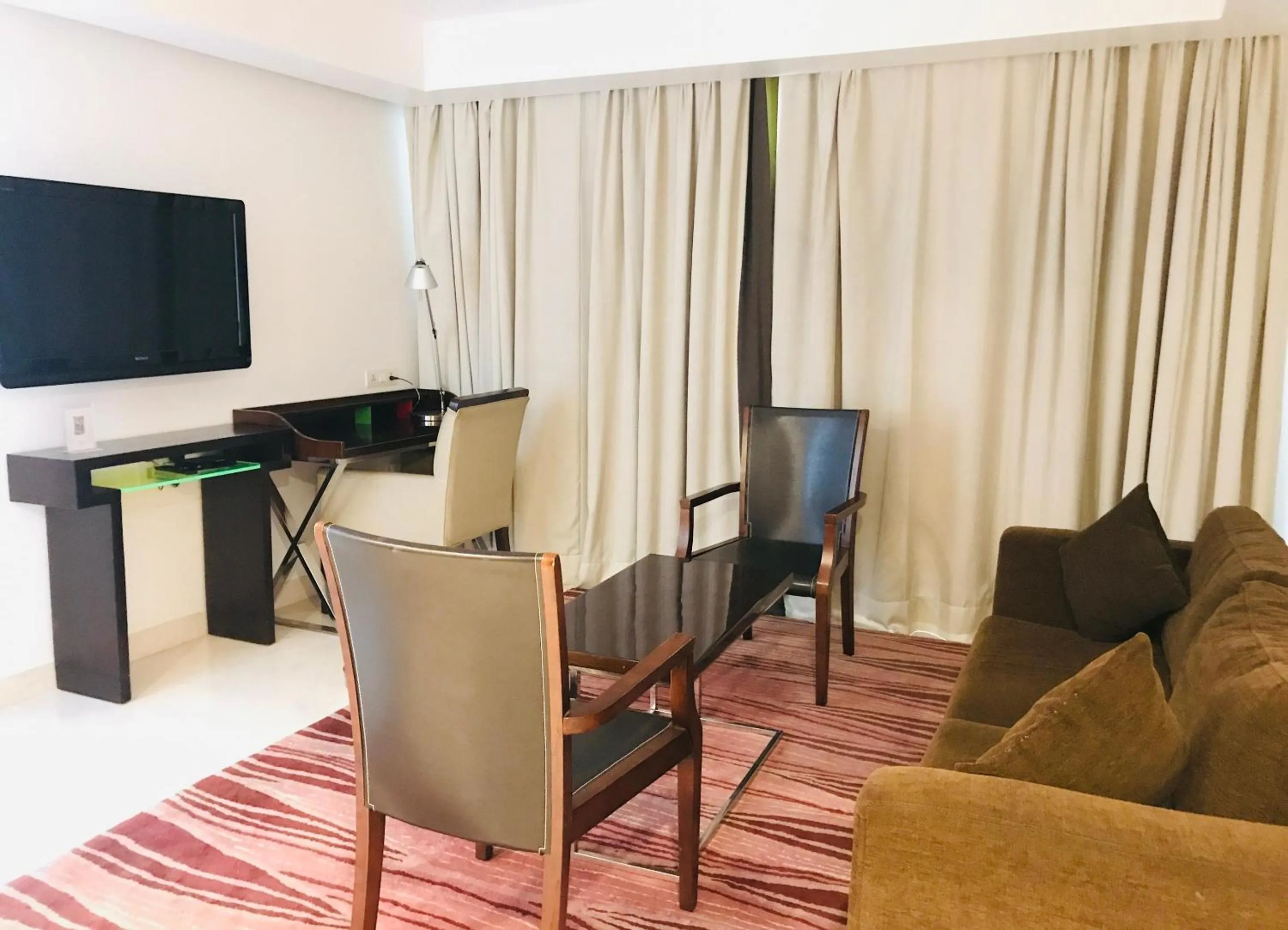 Living room in Golden Tulip City Centre Gurgaon