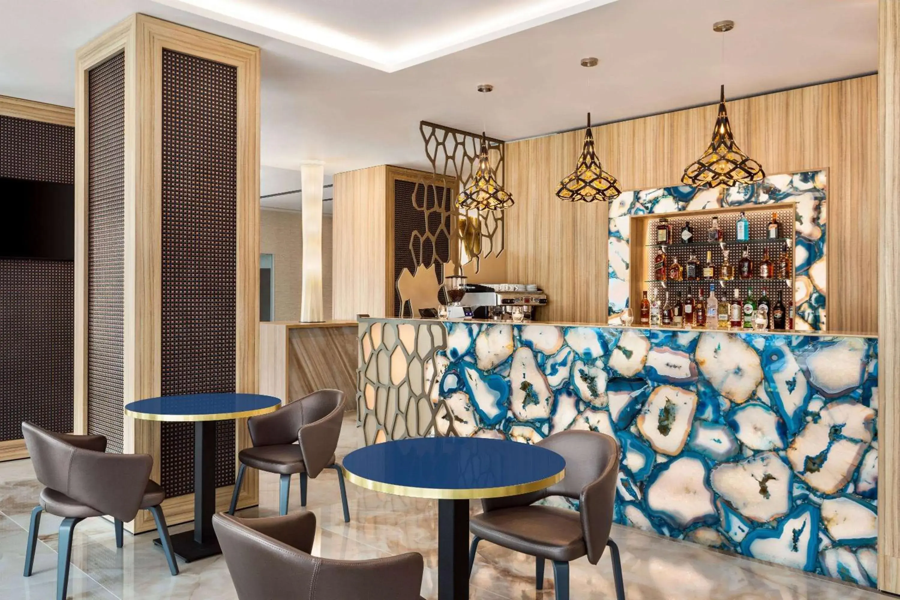 Lounge or bar in Ramada by Wyndham Ramnicu Valcea Lounge or bar in Ramada by Wyndham Ramnicu Valcea