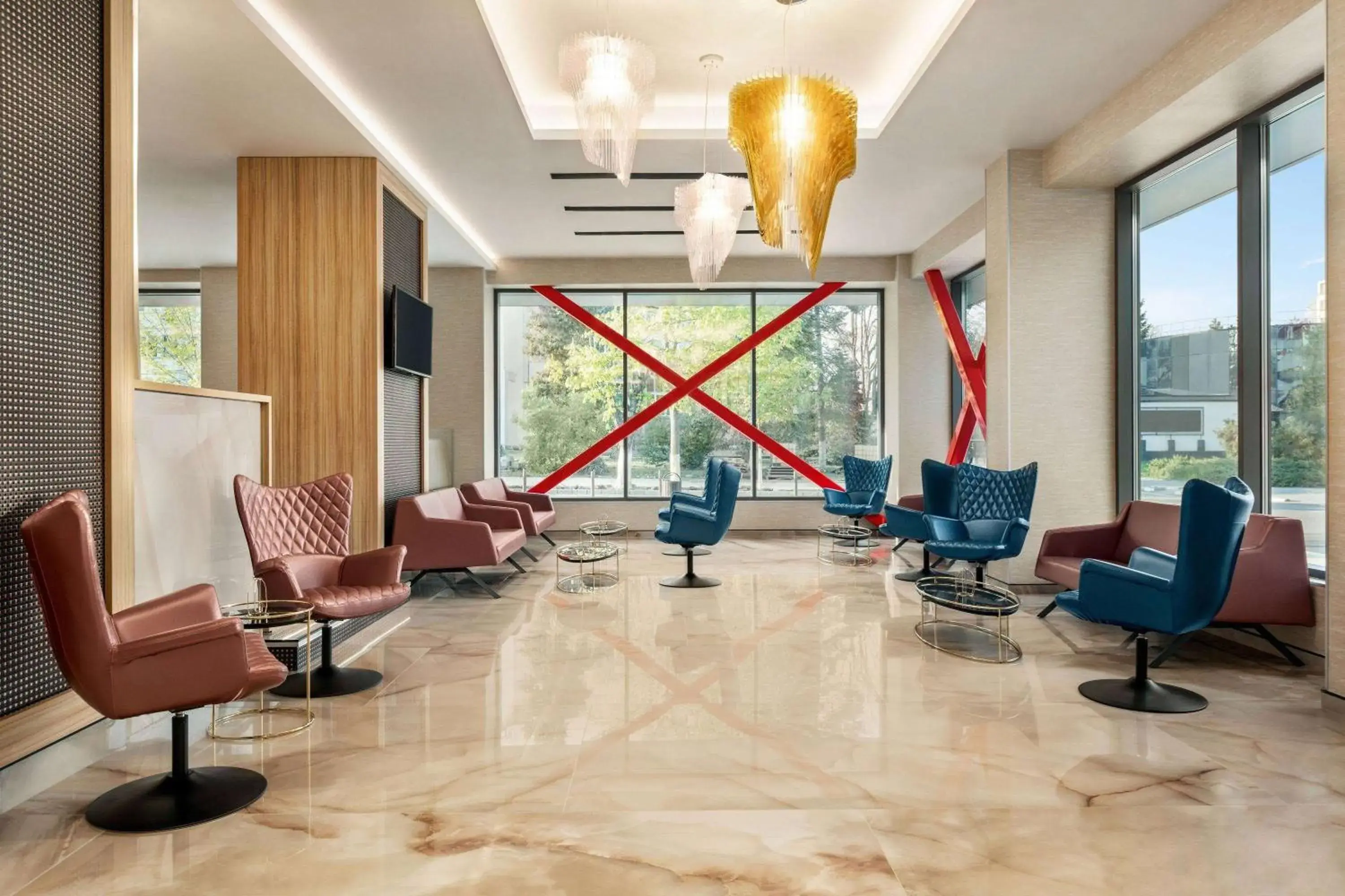 Lobby or reception in Ramada by Wyndham Ramnicu Valcea Lobby or reception in Ramada by Wyndham Ramnicu Valcea