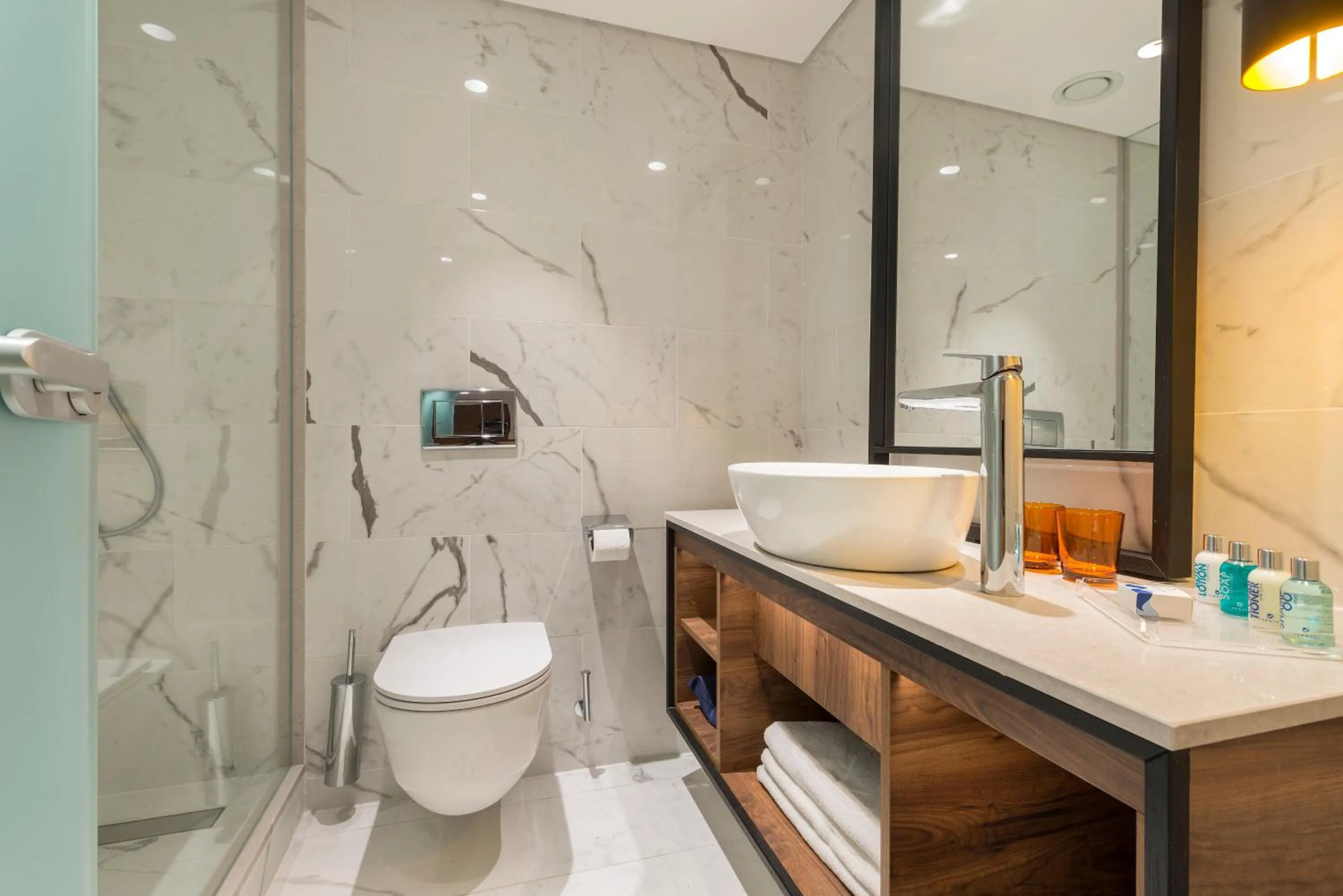 Bathroom in Nevo by Isrotel Collection