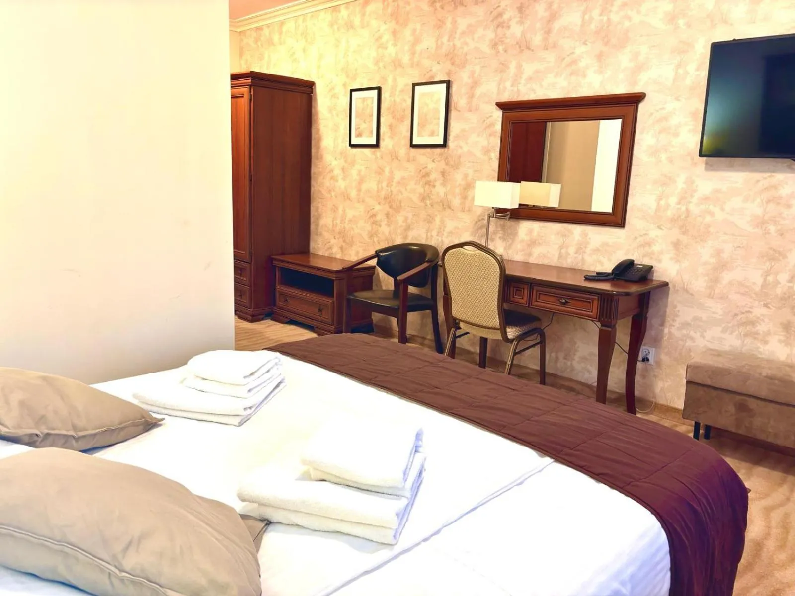 Bed in Cumulus Hotel