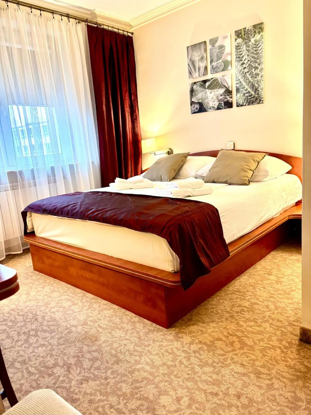 Bed in Cumulus Hotel