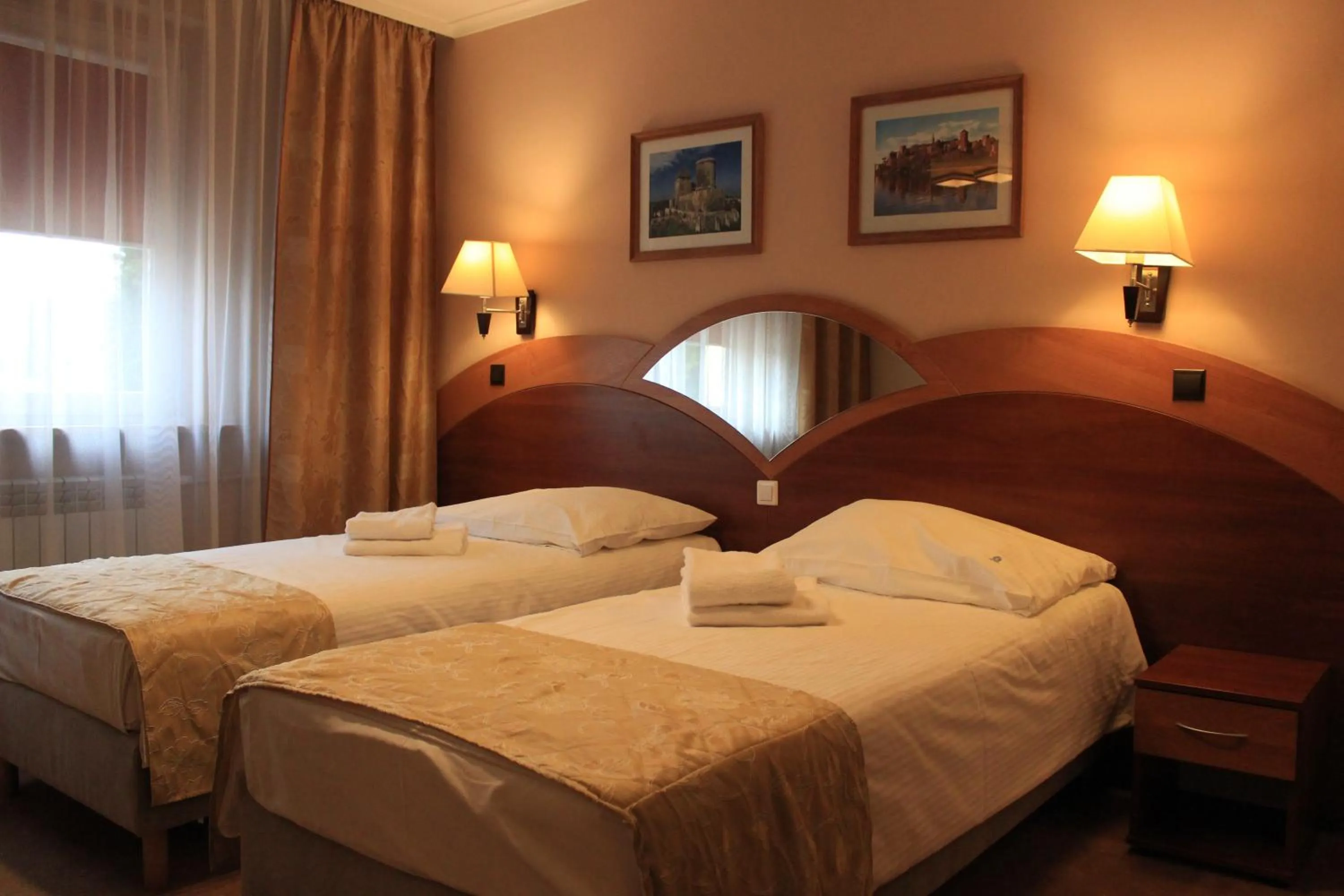 Bed in Cumulus Hotel