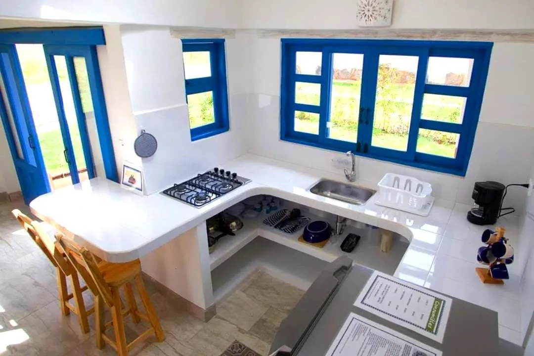 Kitchen or kitchenette in HOTEL & CABAÑAS CASHILUNA