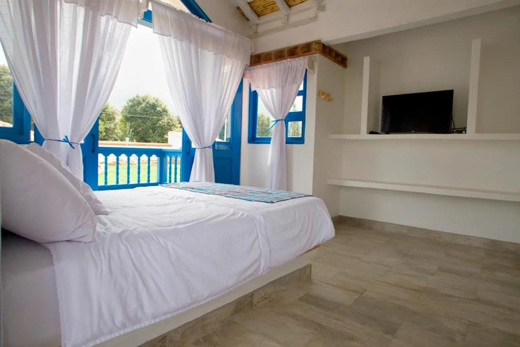 Bed in HOTEL & CABAÑAS CASHILUNA