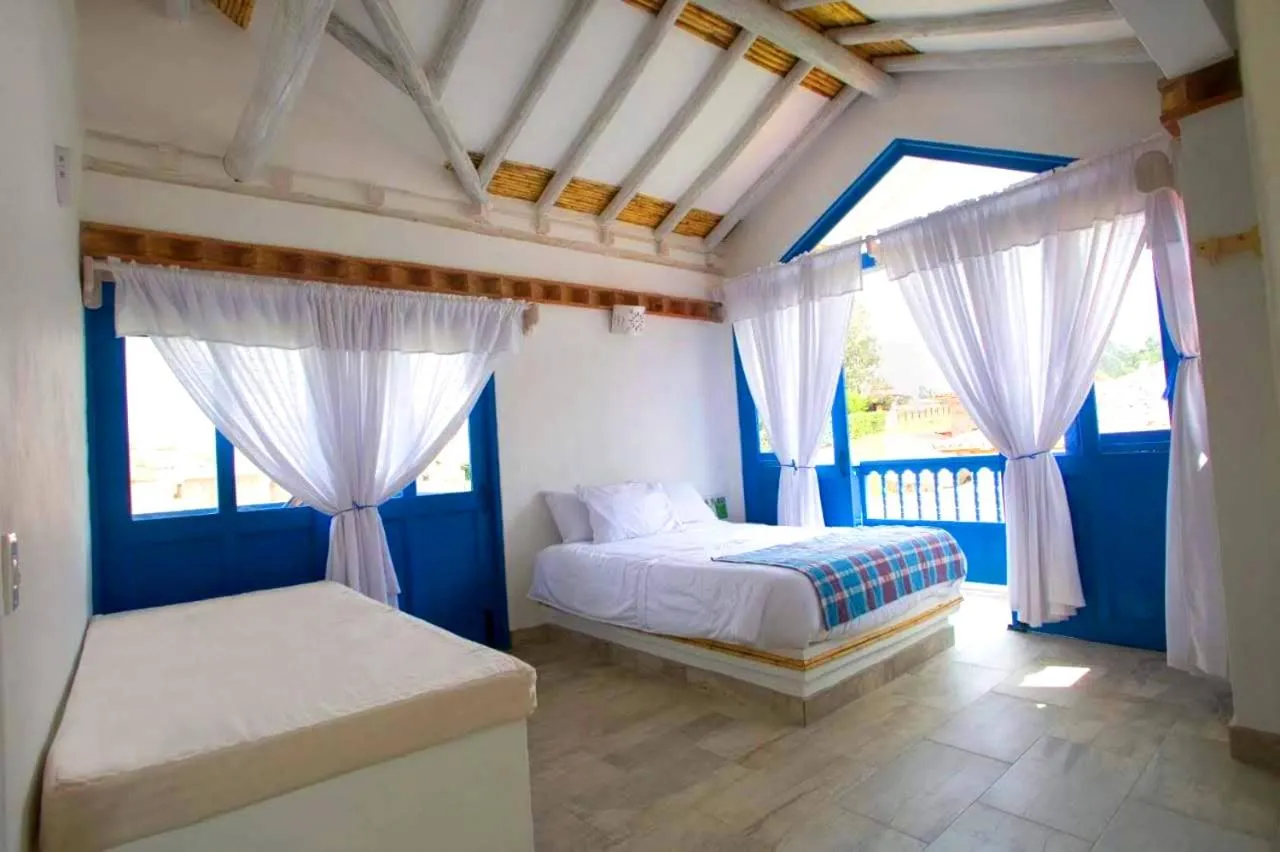 Bed in HOTEL & CABAÑAS CASHILUNA