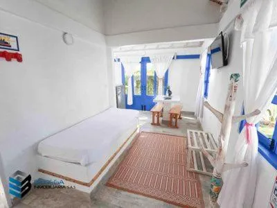 Bed in HOTEL & CABAÑAS CASHILUNA