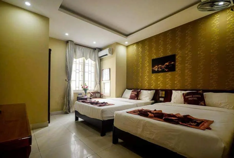 Bed in Phuc Long Hotel