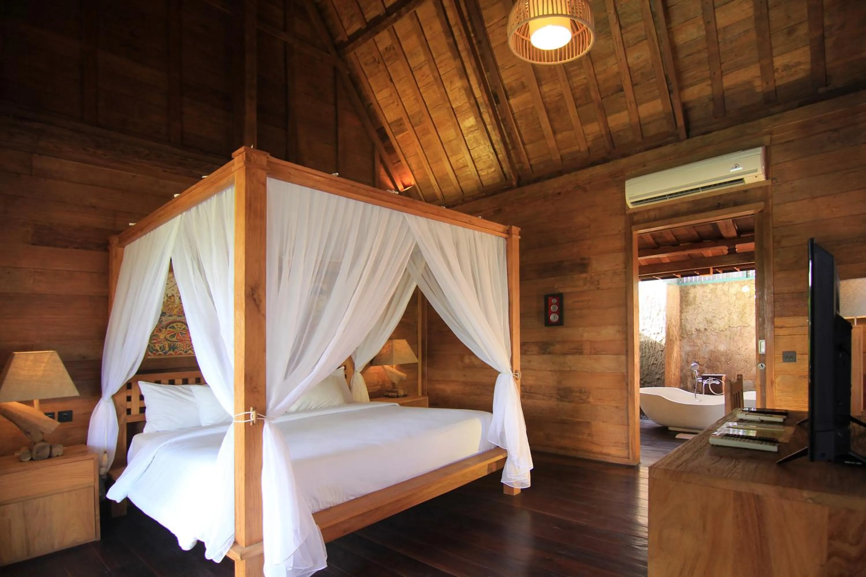 Bed in Taulan Villa by Social Hideout