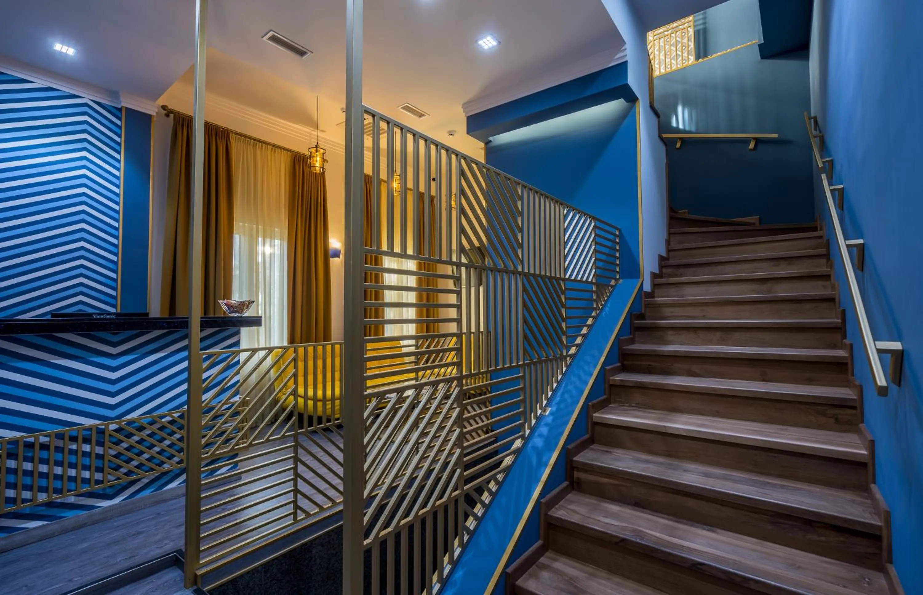 Communal lounge/ TV room in Gladius Inn Boutique Hotel by DNT Group