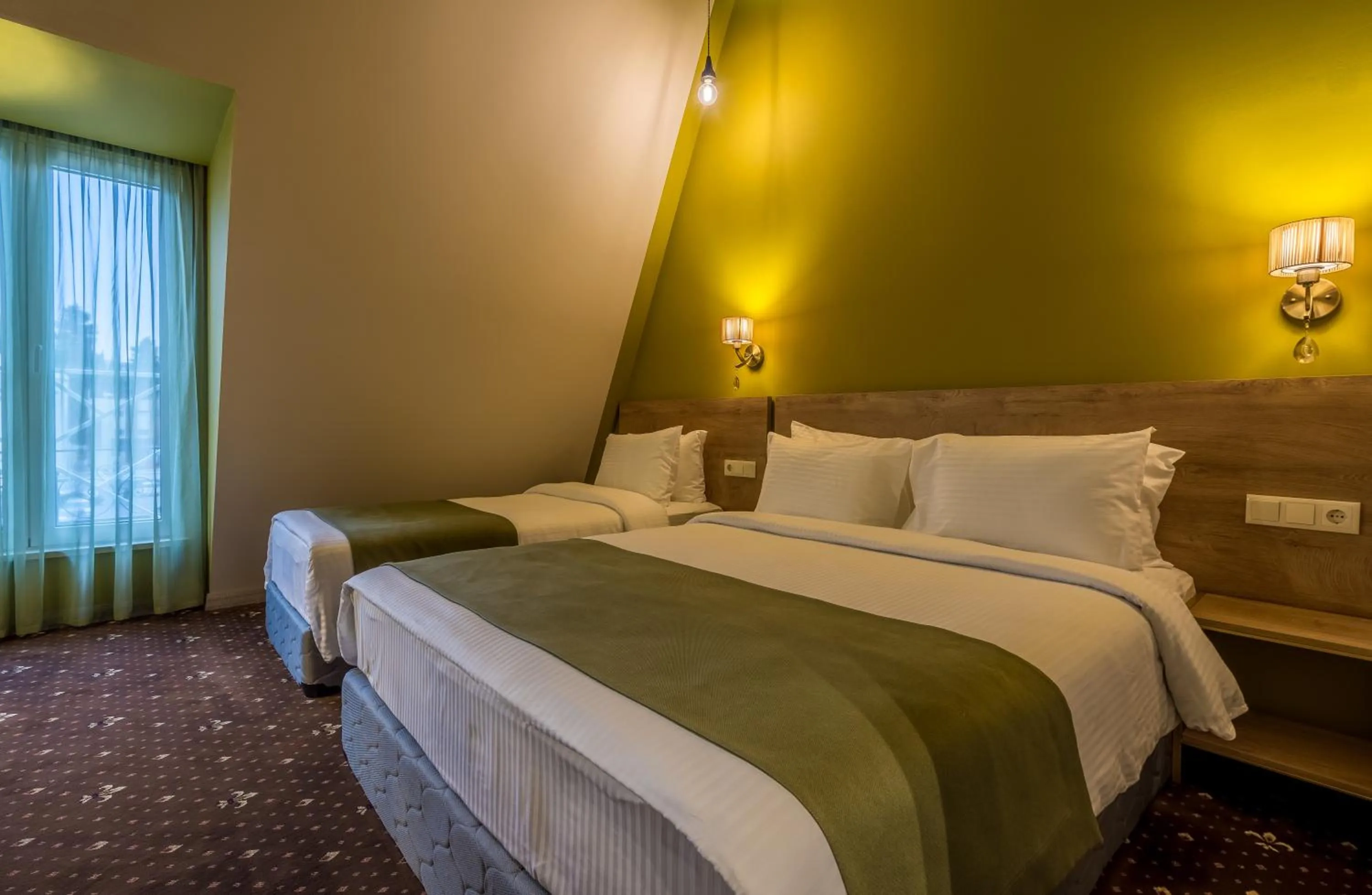 Bed in Gladius Inn Boutique Hotel by DNT Group