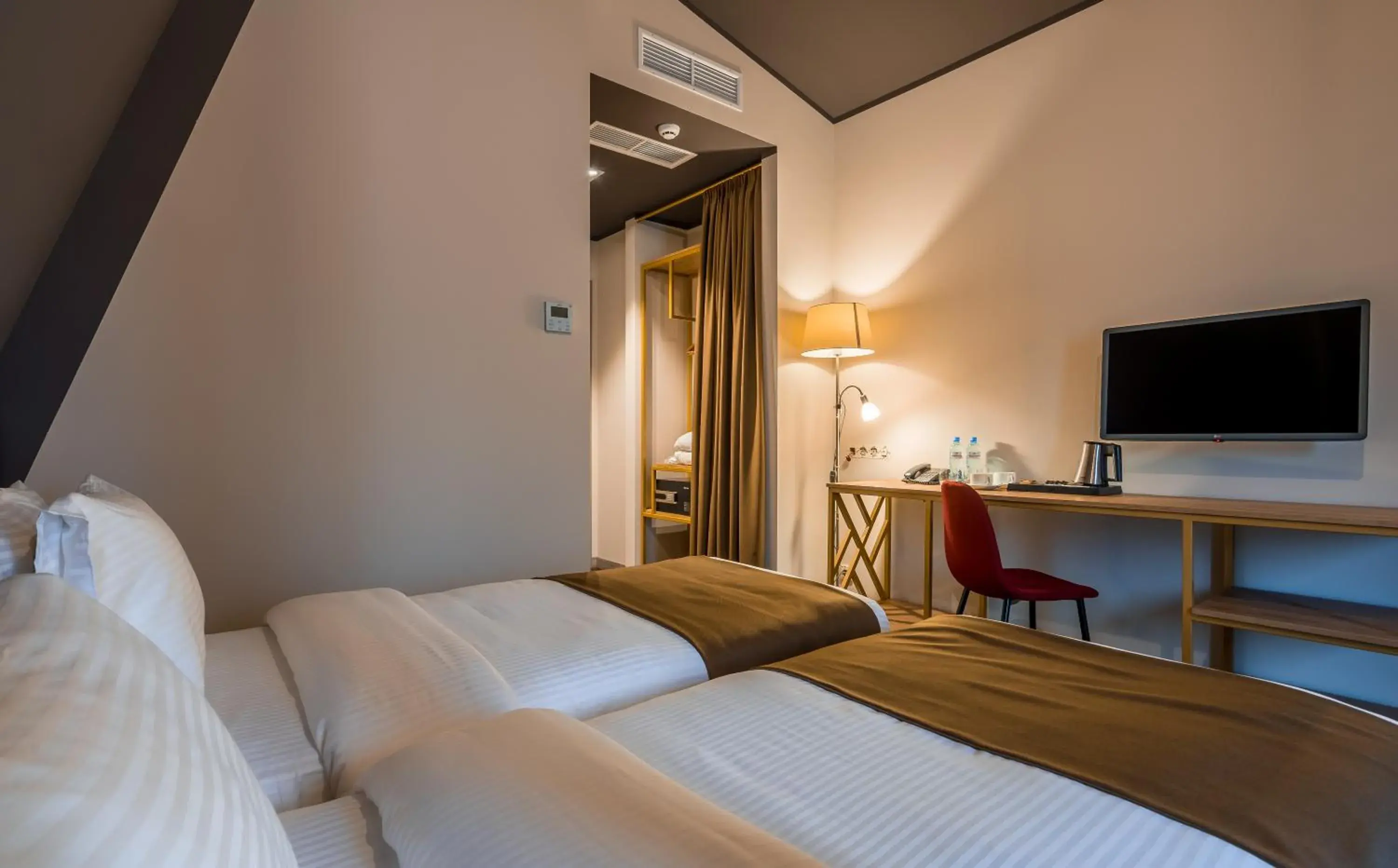 Bed in Gladius Inn Boutique Hotel by DNT Group Bed in Gladius Inn Boutique Hotel by DNT Group