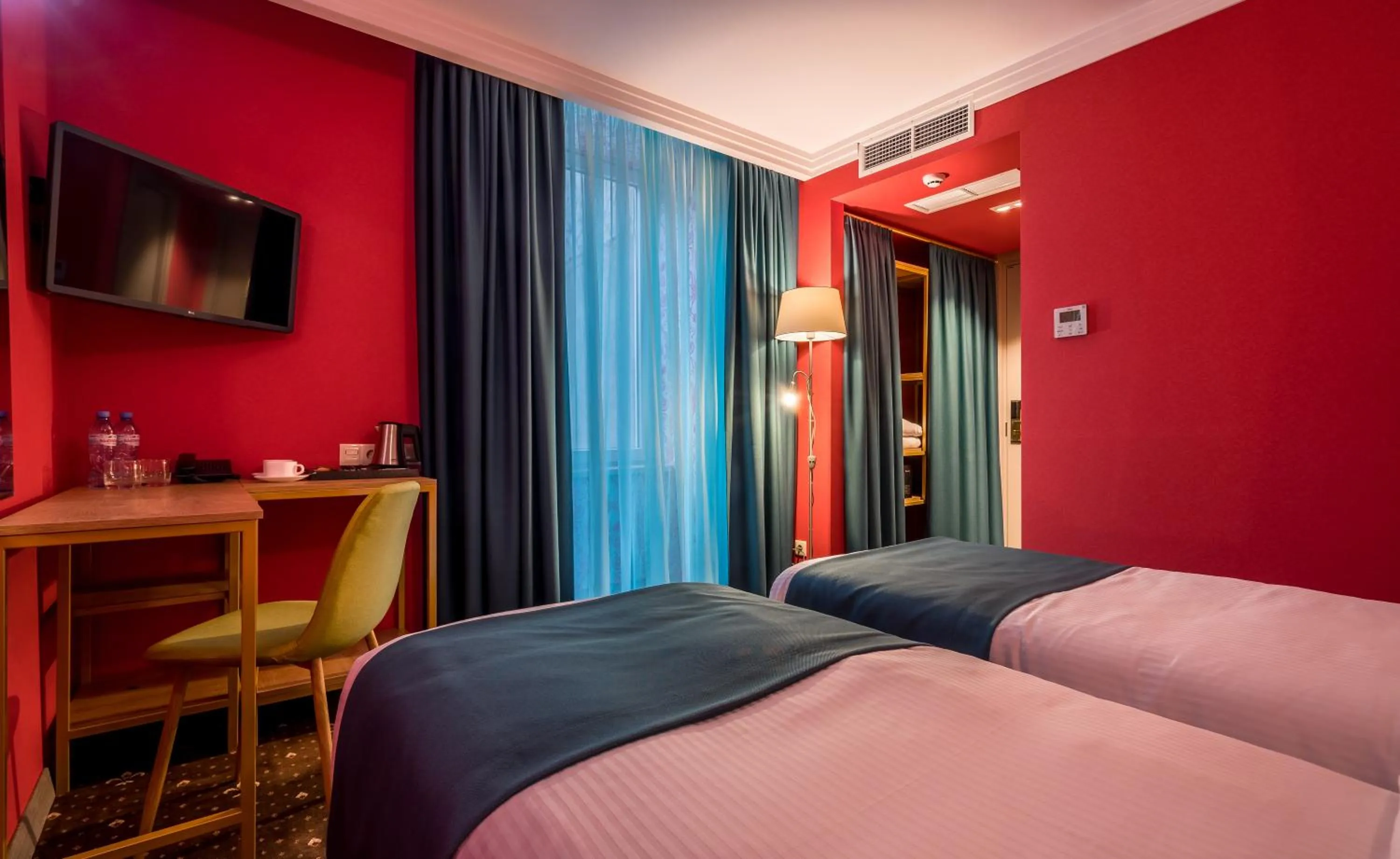 Bed in Gladius Inn Boutique Hotel by DNT Group